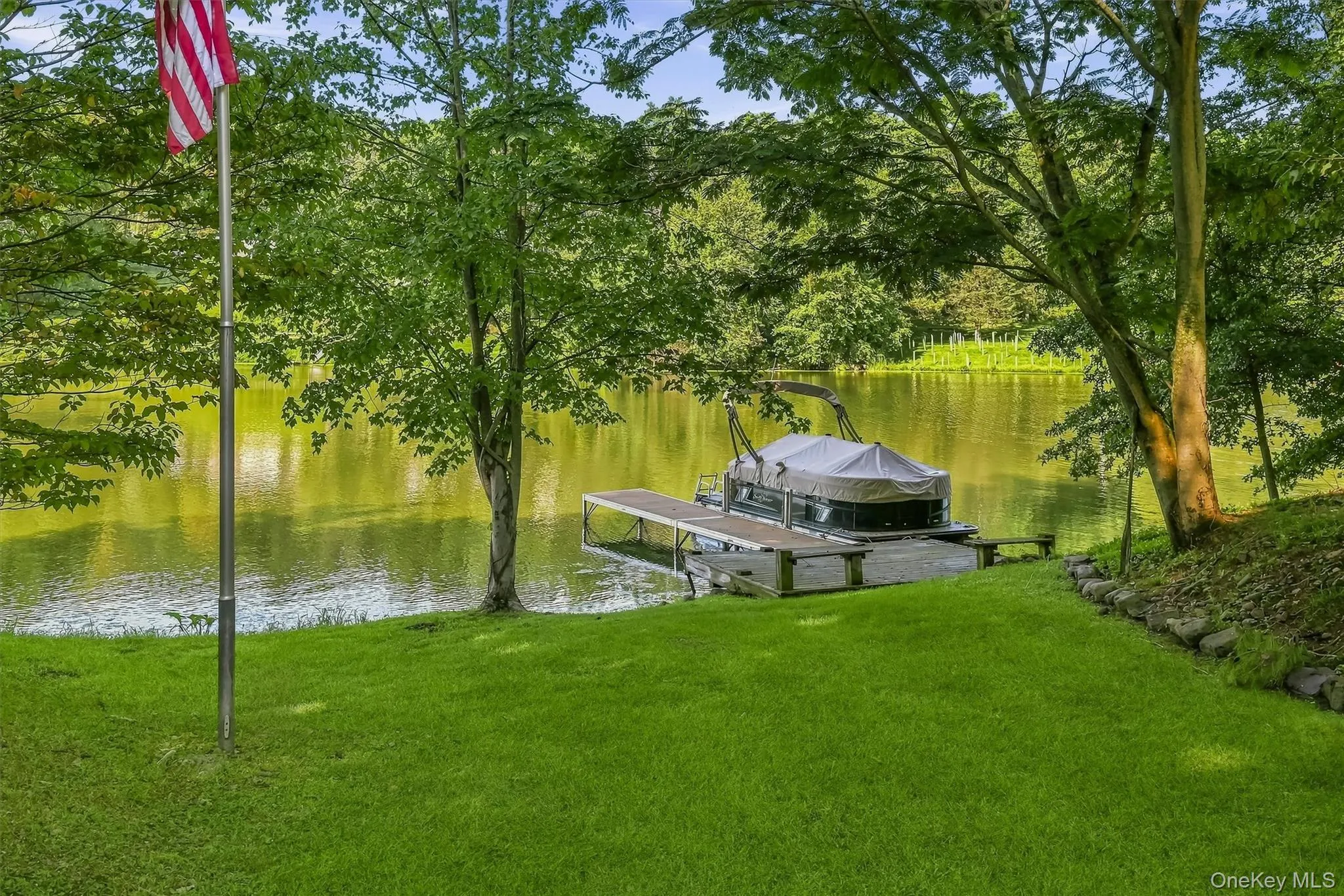 Private shoreline. Your boat (available for purchase). Endless summer days on the water. Private shoreline. Your boat (available for purchase). Endless summer days on the water.