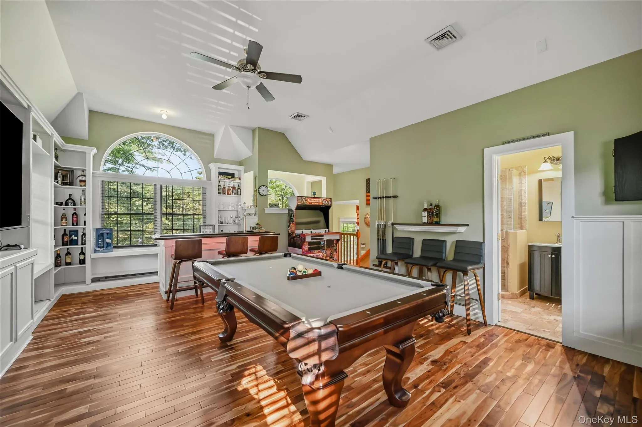 A true entertainer’s retreat with custom bar and pool table—perfect for game nights, gatherings, and making memories. A true entertainer’s retreat with custom bar and pool table—perfect for game nights, gatherings, and making memories.