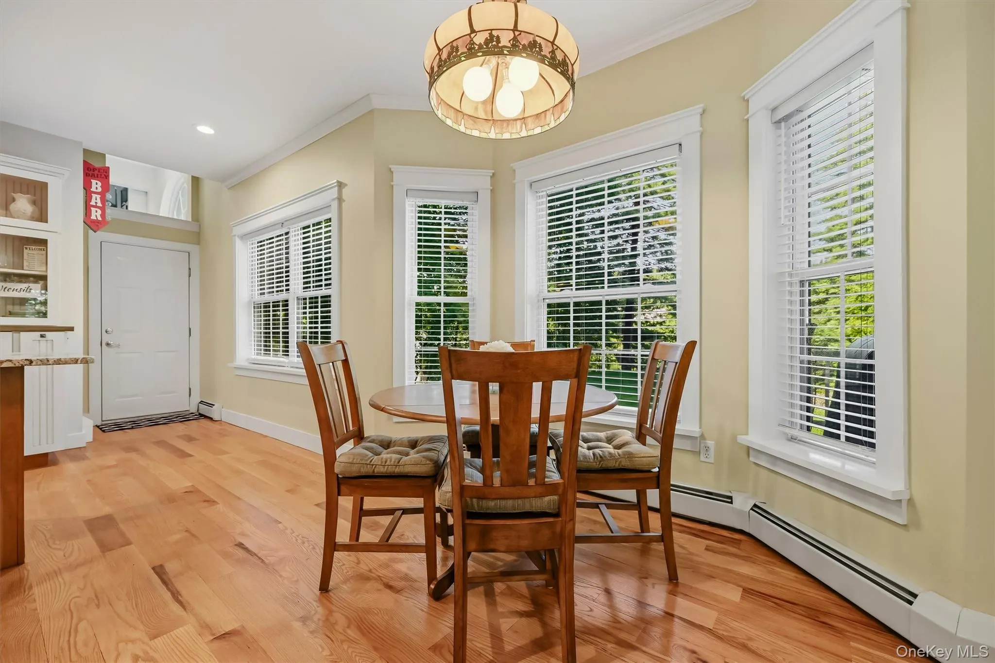 Charming breakfast nook with lake views through the bump-out window. Charming breakfast nook with lake views through the bump-out window.
