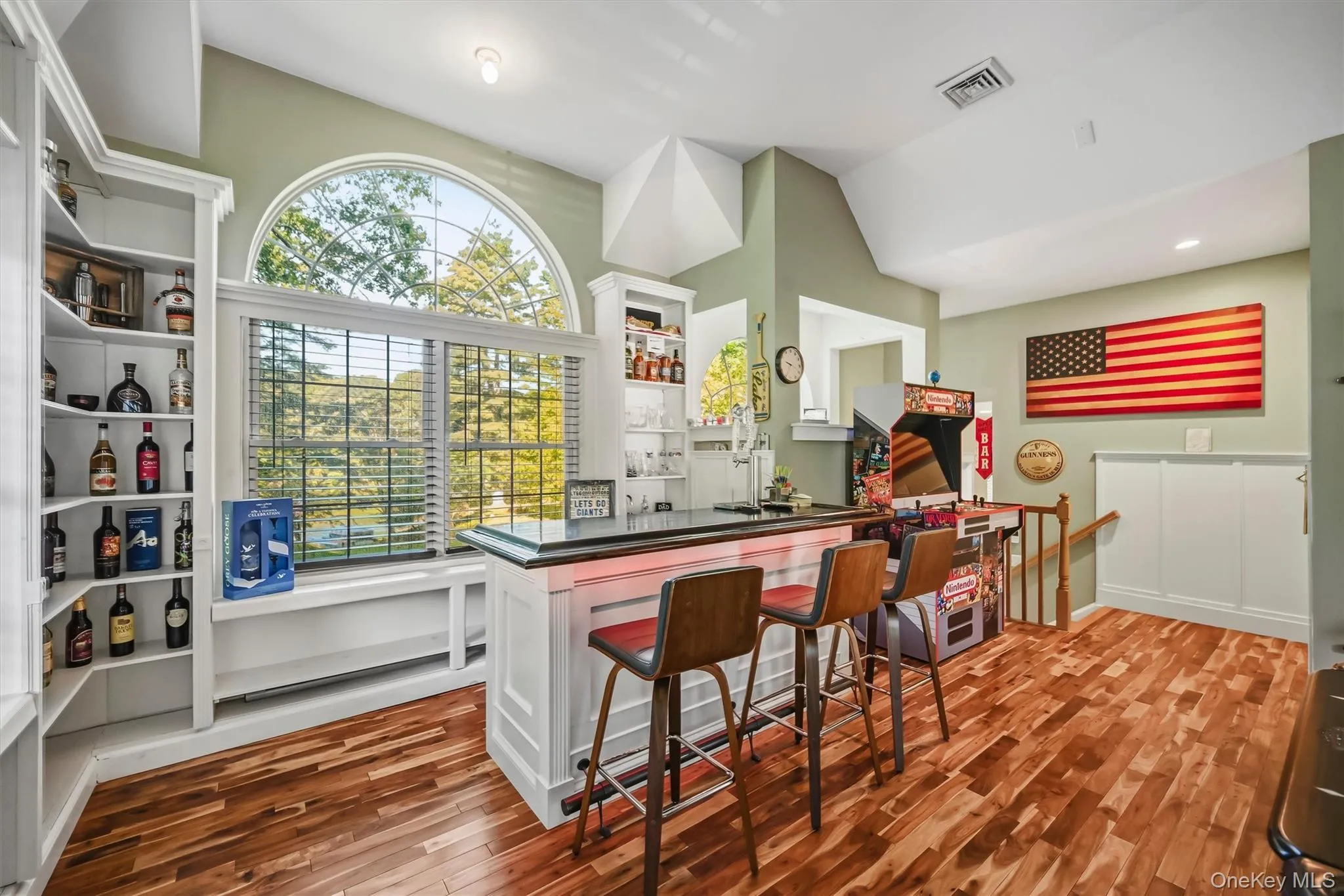 The ultimate entertaining setup with a fully equipped wet bar, beverage fridge, and keg tap system The ultimate entertaining setup with a fully equipped wet bar, beverage fridge, and keg tap system