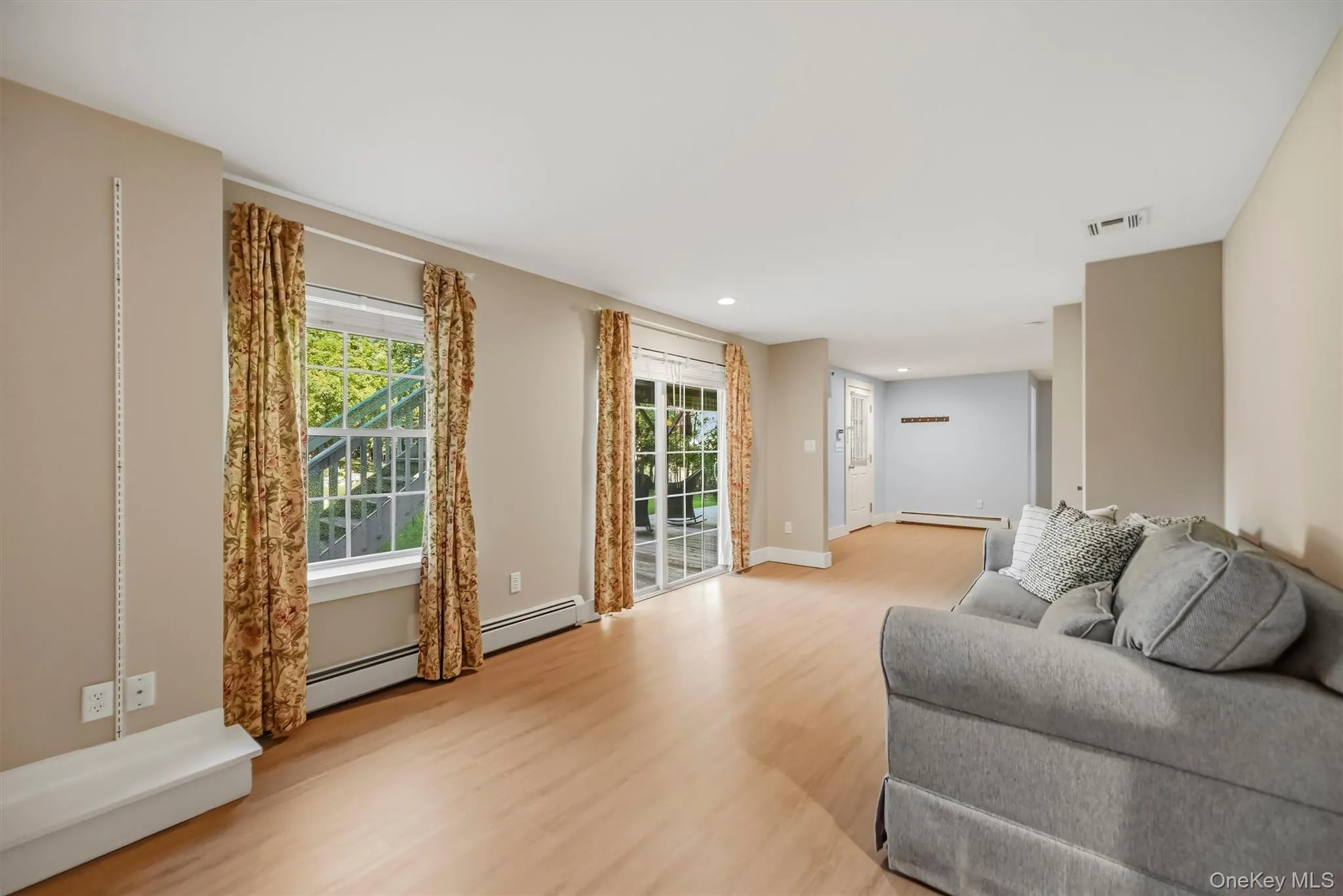 Open-concept layout offers seamless flow between the main living areas and a separate space for guests. Open-concept layout offers seamless flow between the main living areas and a separate space for guests.