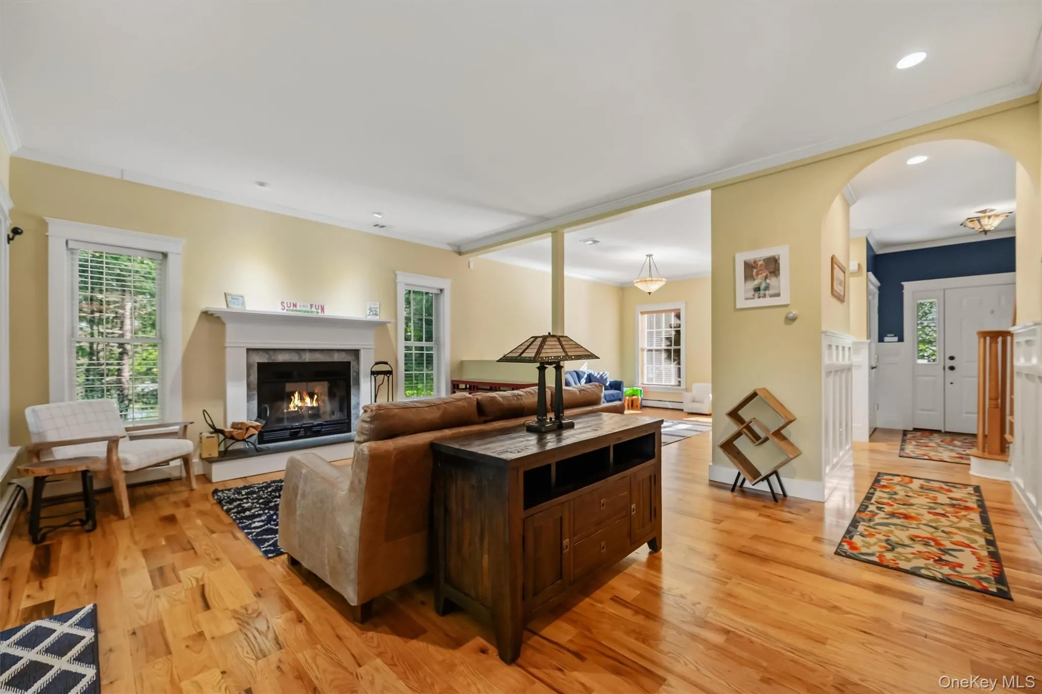 Wood-burning fireplace and recessed lighting create a warm, inviting space--perfect for cozy evenings or relaxing after a day on the lake. Wood-burning fireplace and recessed lighting create a warm, inviting space--perfect for cozy evenings or relaxing after a day on the lake.