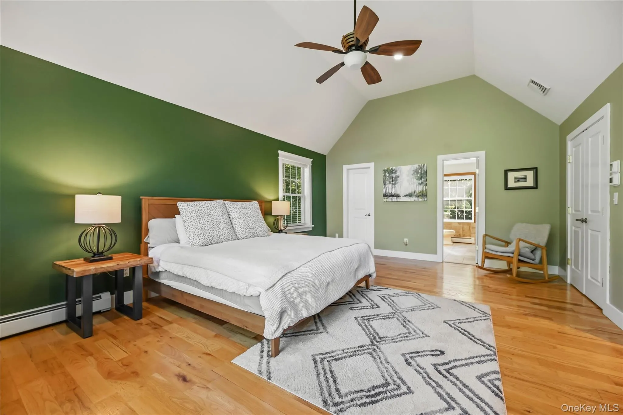 Private primary sanctuary with two large closets, one featuring custom built-in drawers, plus a private en-suite bath. Private primary sanctuary with two large closets, one featuring custom built-in drawers, plus a private en-suite bath.