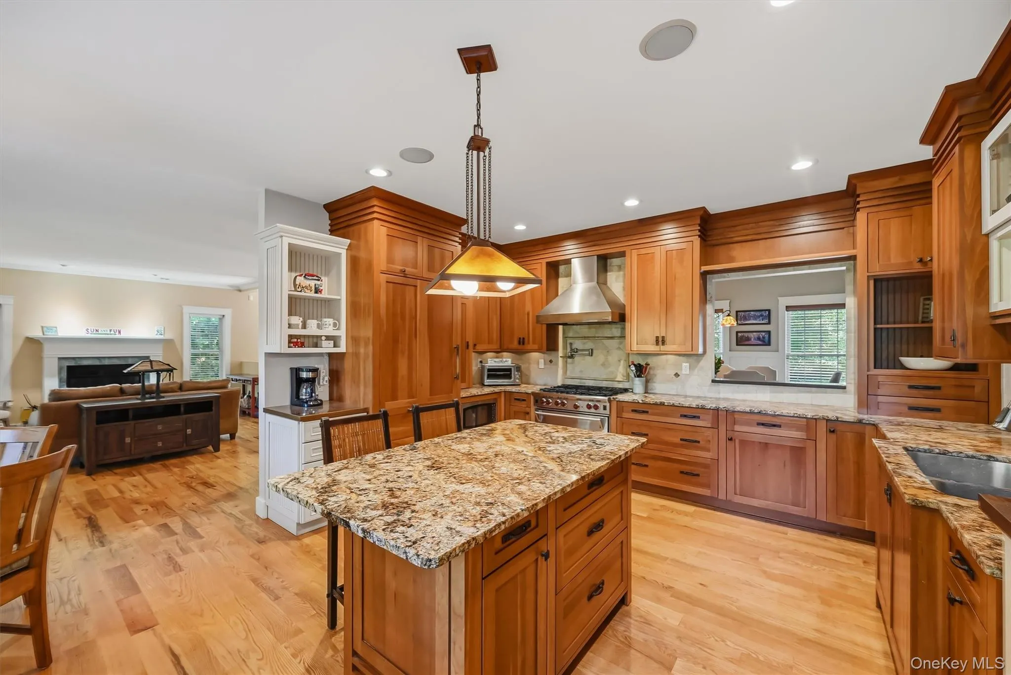 Large center island provides generous workspace for meal prep, casual dining, and entertaining. Large center island provides generous workspace for meal prep, casual dining, and entertaining.