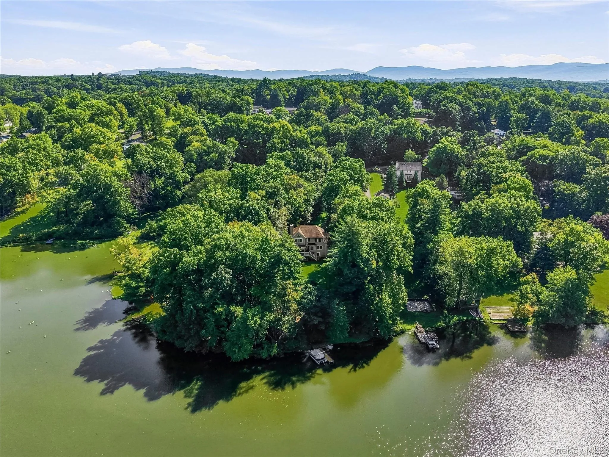Seen from above, it all comes together: the home, the private dock, and the open water of Beaverdam Lake just steps from your back door. Seen from above, it all comes together: the home, the private dock, and the open water of Beaverdam Lake just steps from your back door.