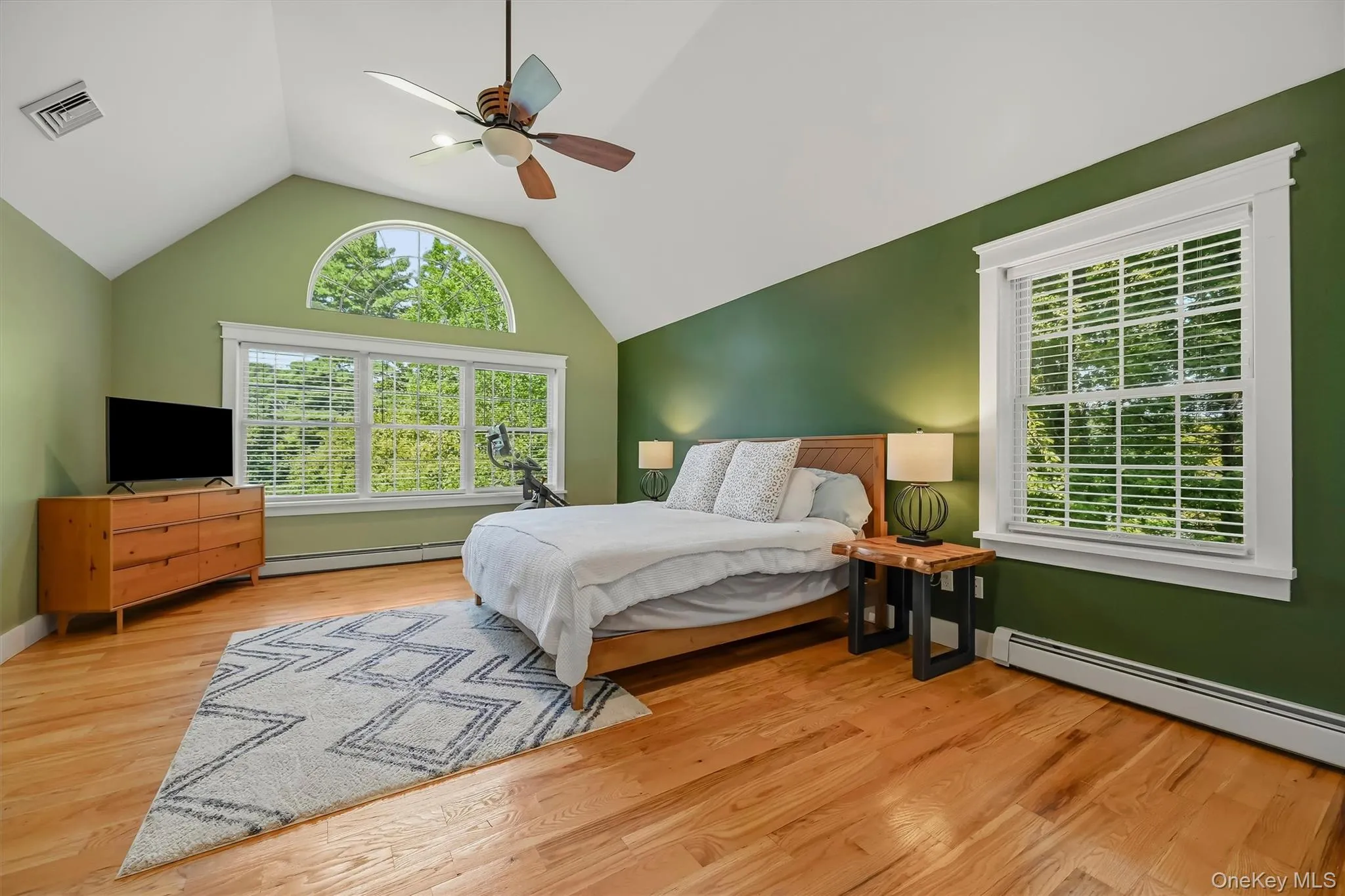 Spacious primary retreat with room to create a private fitness space and sweeping lake views. Spacious primary retreat with room to create a private fitness space and sweeping lake views.