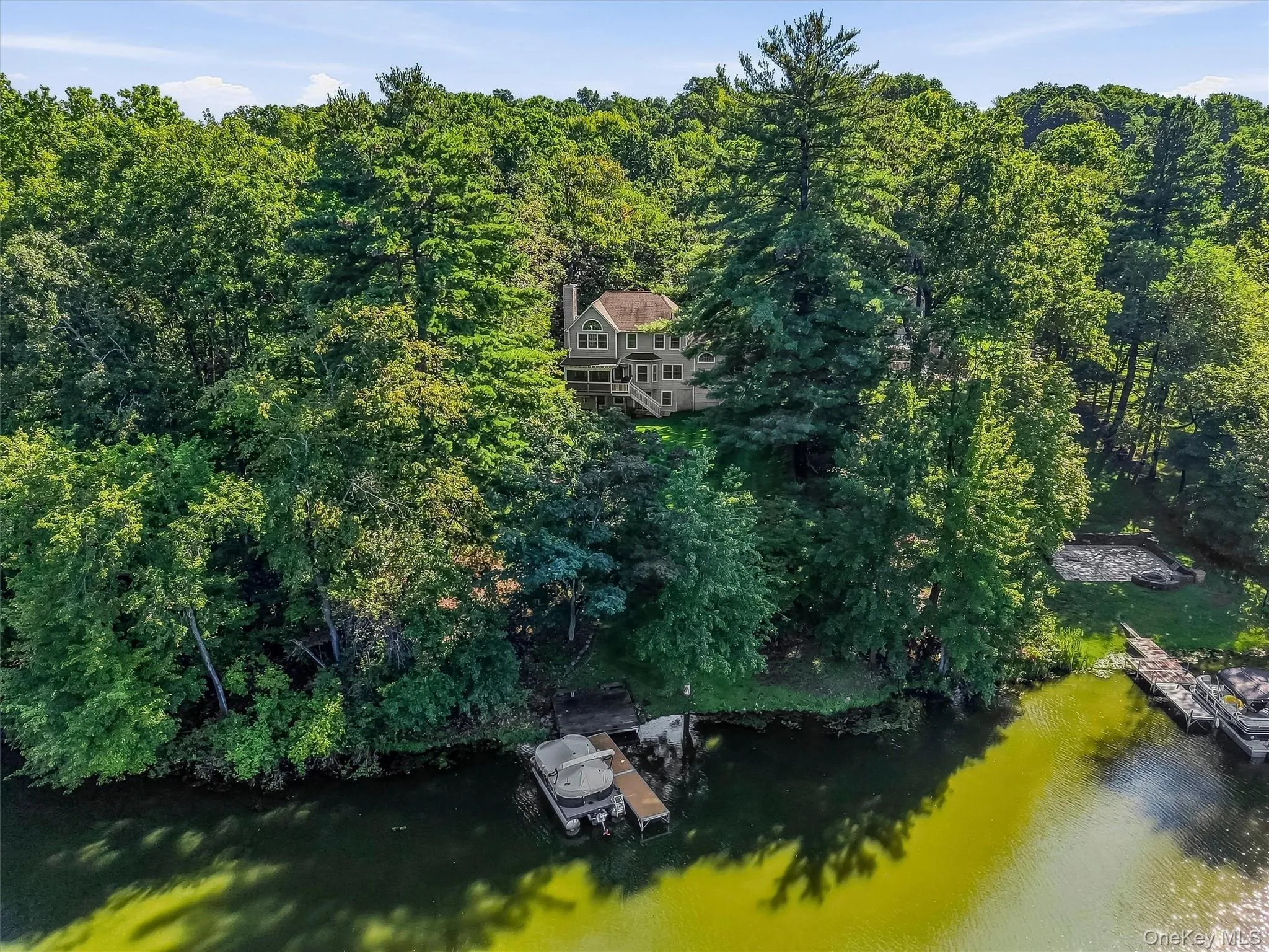 The aerial perspective shows the private lakefront setting with exceptional access to Beaverdam Lake. The aerial perspective shows the private lakefront setting with exceptional access to Beaverdam Lake.