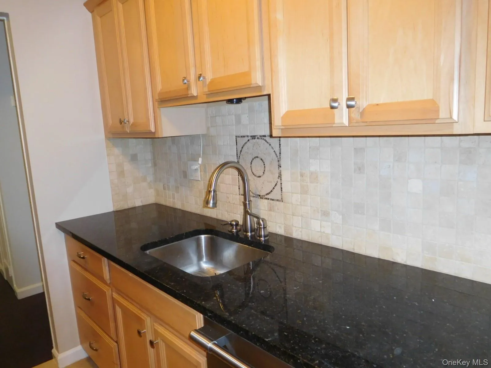Opposite view of Renovated Kitchen Opposite view of Renovated Kitchen