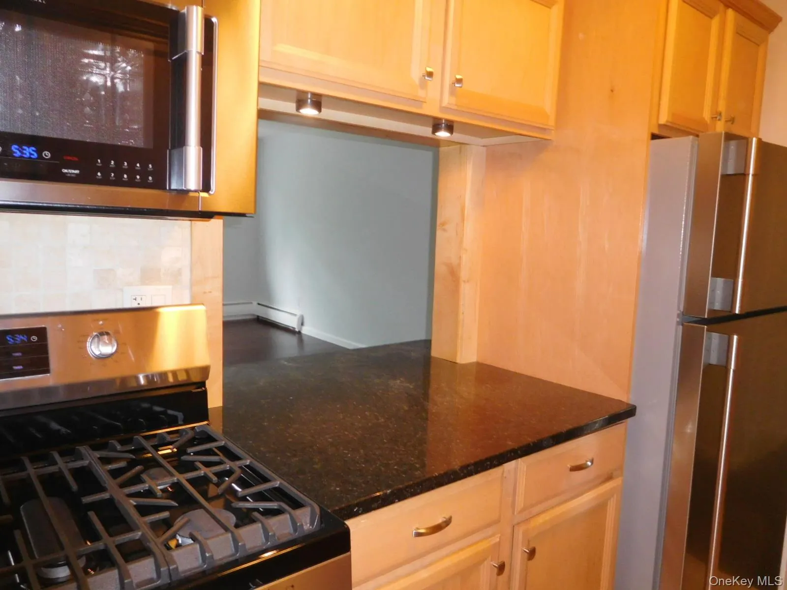 Opposite view of Renovated Kitchen Opposite view of Renovated Kitchen