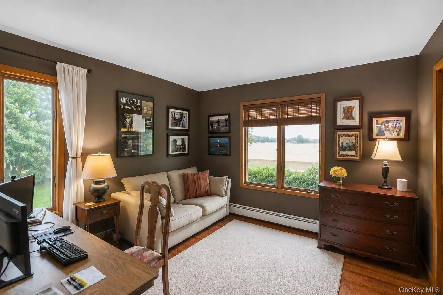 Bedroom 4. Hardwood flooring, natural wood window trim, large windows, and a glass-paneled exterior door. Can also use as an office or home gym Bedroom 4. Hardwood flooring, natural wood window trim, large windows, and a glass-paneled exterior door. Can also use as an office or home gym