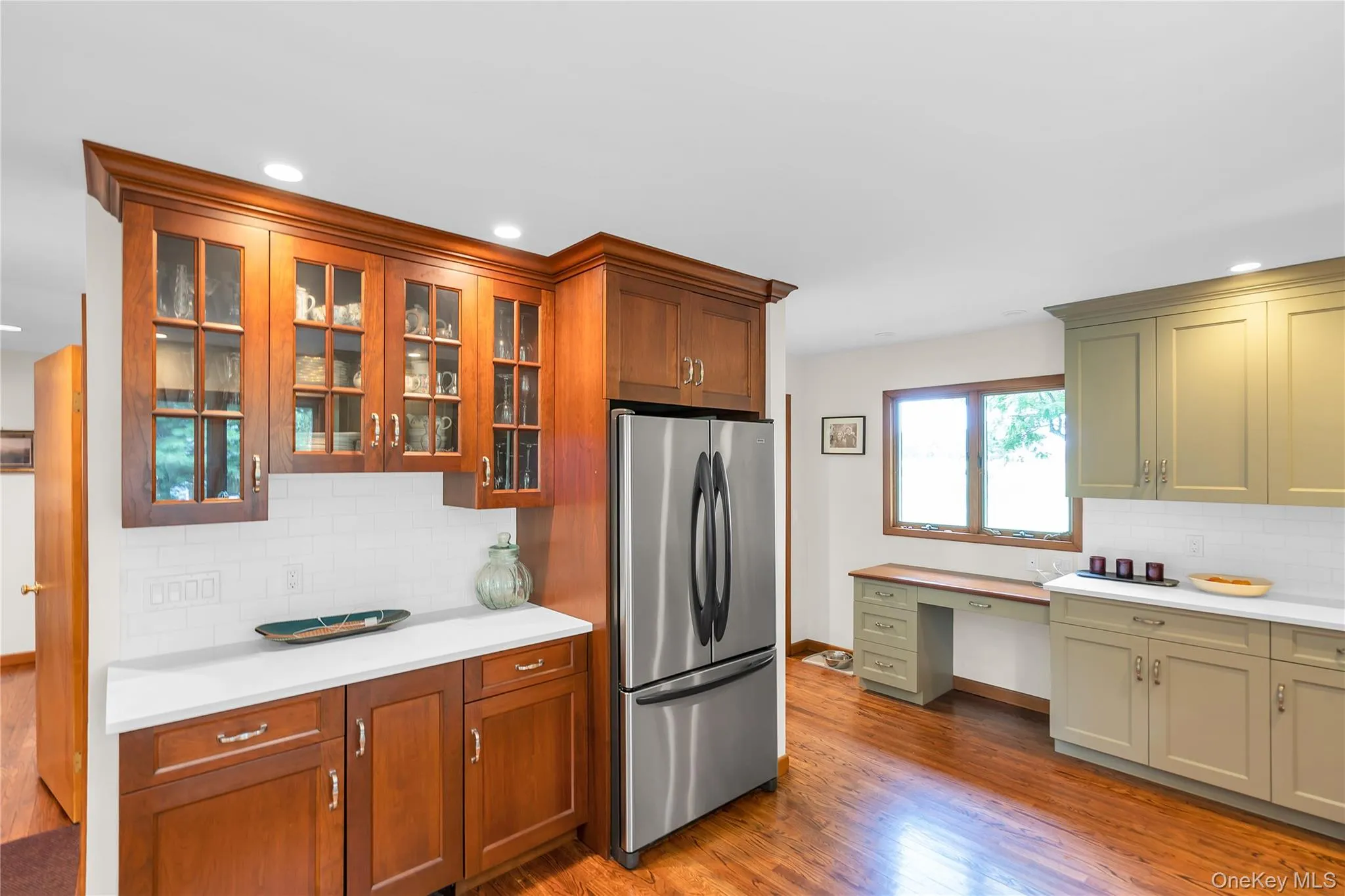 Custom wine bar with wine fridge, cabinets and built in refrigerator Custom wine bar with wine fridge, cabinets and built in refrigerator