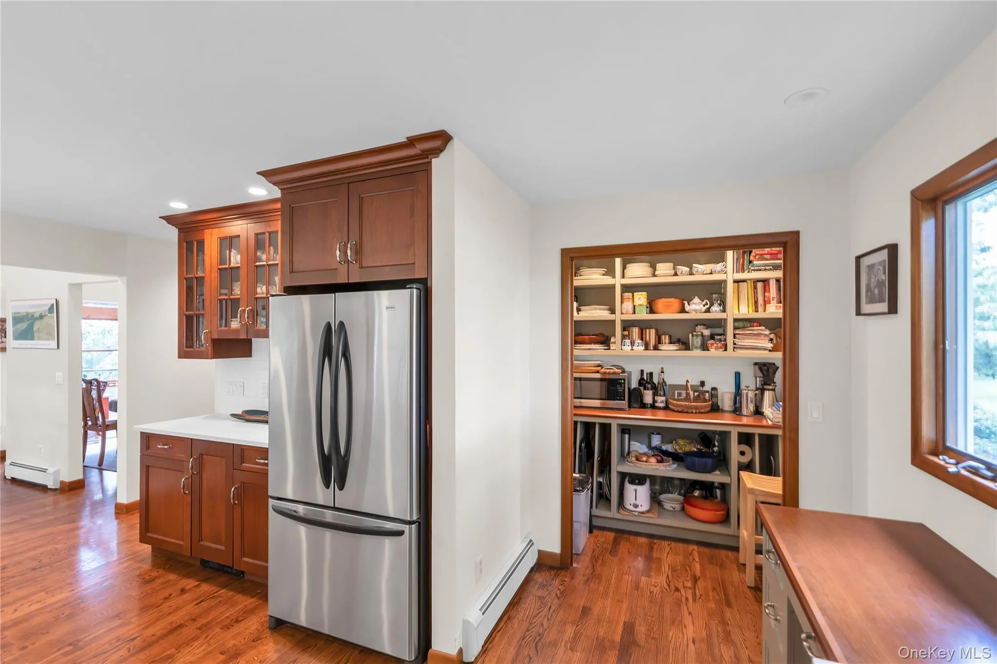 Kitchen with custom pantry area and storage Kitchen with custom pantry area and storage