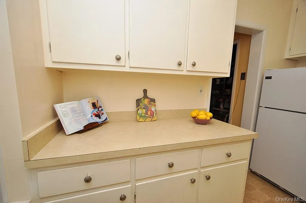 The kitchen has plenty of cabinets and counter space and even a window for natural light and ventilation. The kitchen has plenty of cabinets and counter space and even a window for natural light and ventilation.