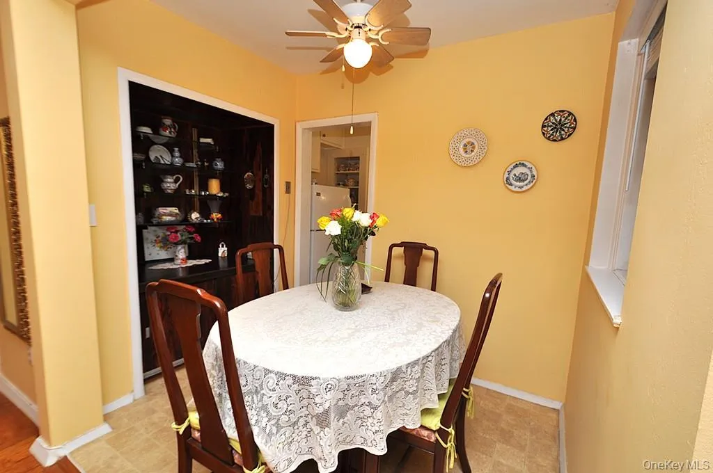 The dining area is just outside the kitchen and opens to the Living room. The dining area is just outside the kitchen and opens to the Living room.