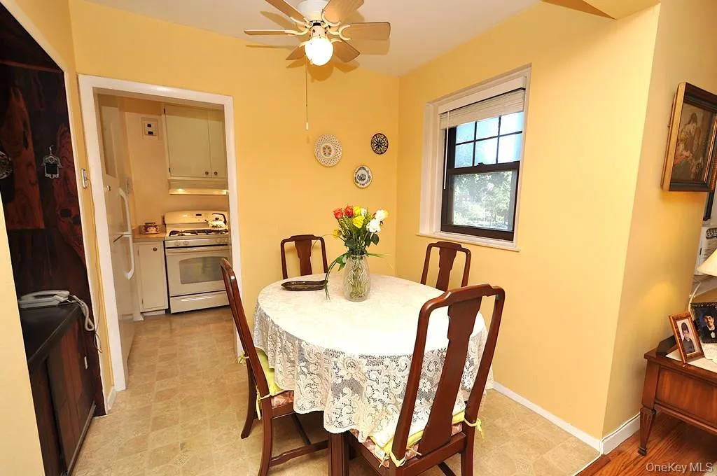 The dining area is just outside the kitchen and opens to the Living room. The dining area is just outside the kitchen and opens to the Living room.