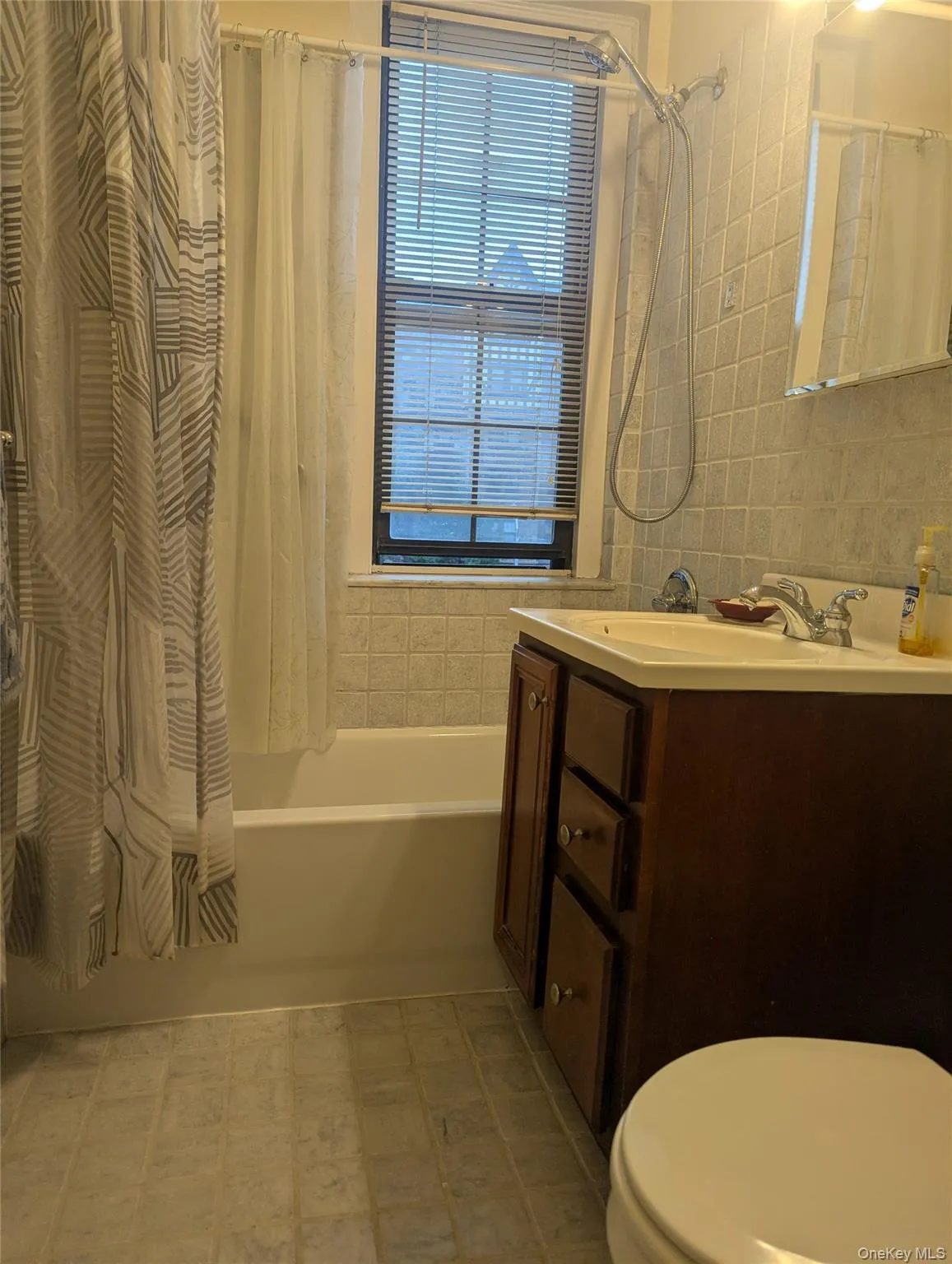 Tastefully updated bath with window Tastefully updated bath with window
