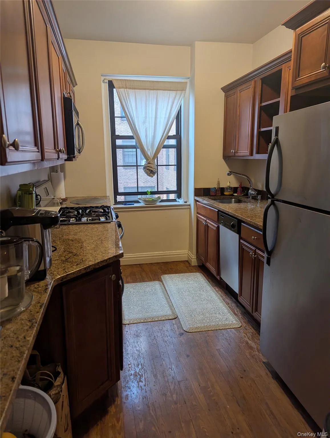Spacious galley kitchen 8x10 and 1/2 with window. Modern cabinetry and dishwasher. Spacious galley kitchen 8x10 and 1/2 with window. Modern cabinetry and dishwasher.