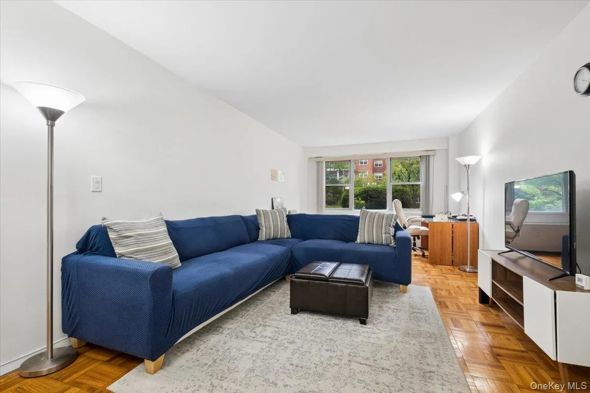 Enjoy entertaining in the bright living room area open to dining Enjoy entertaining in the bright living room area open to dining