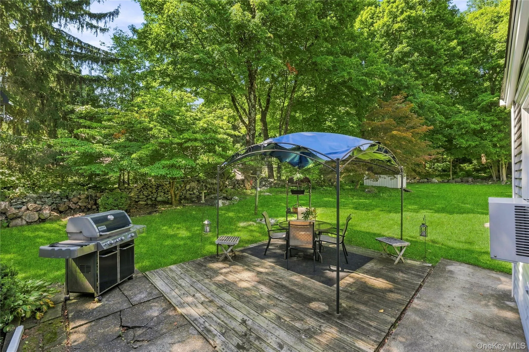 Patio off the kitchen and great room. Patio off the kitchen and great room.