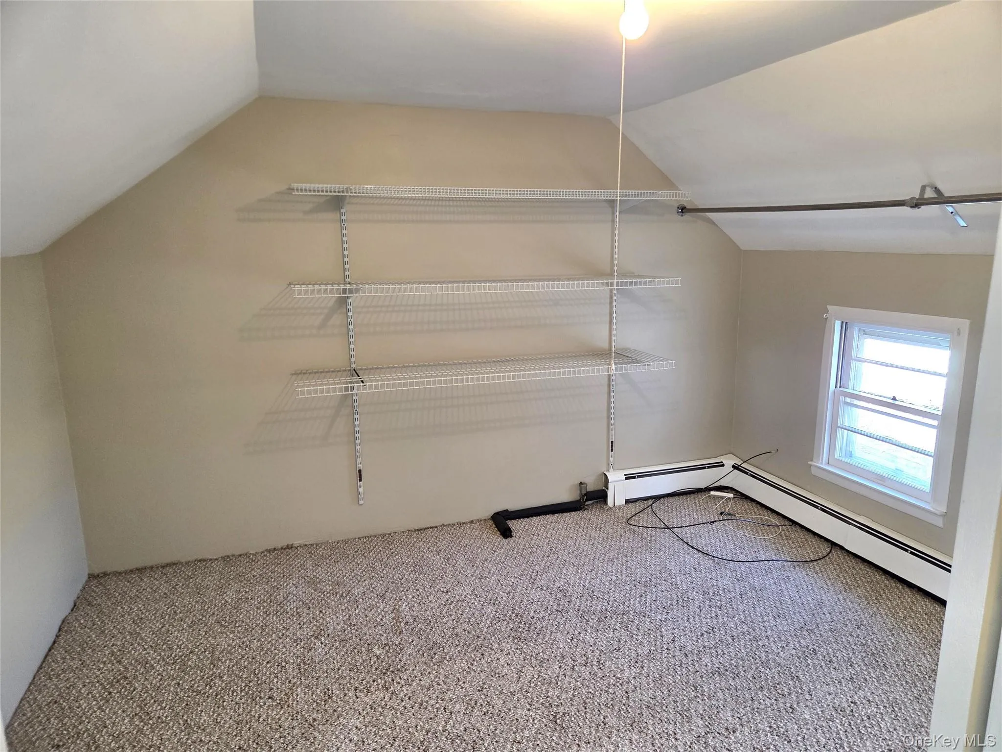 The Second Level Offers A Huge Freshly Painted Walk In Closet/Storage Room. The Second Level Offers A Huge Freshly Painted Walk In Closet/Storage Room.