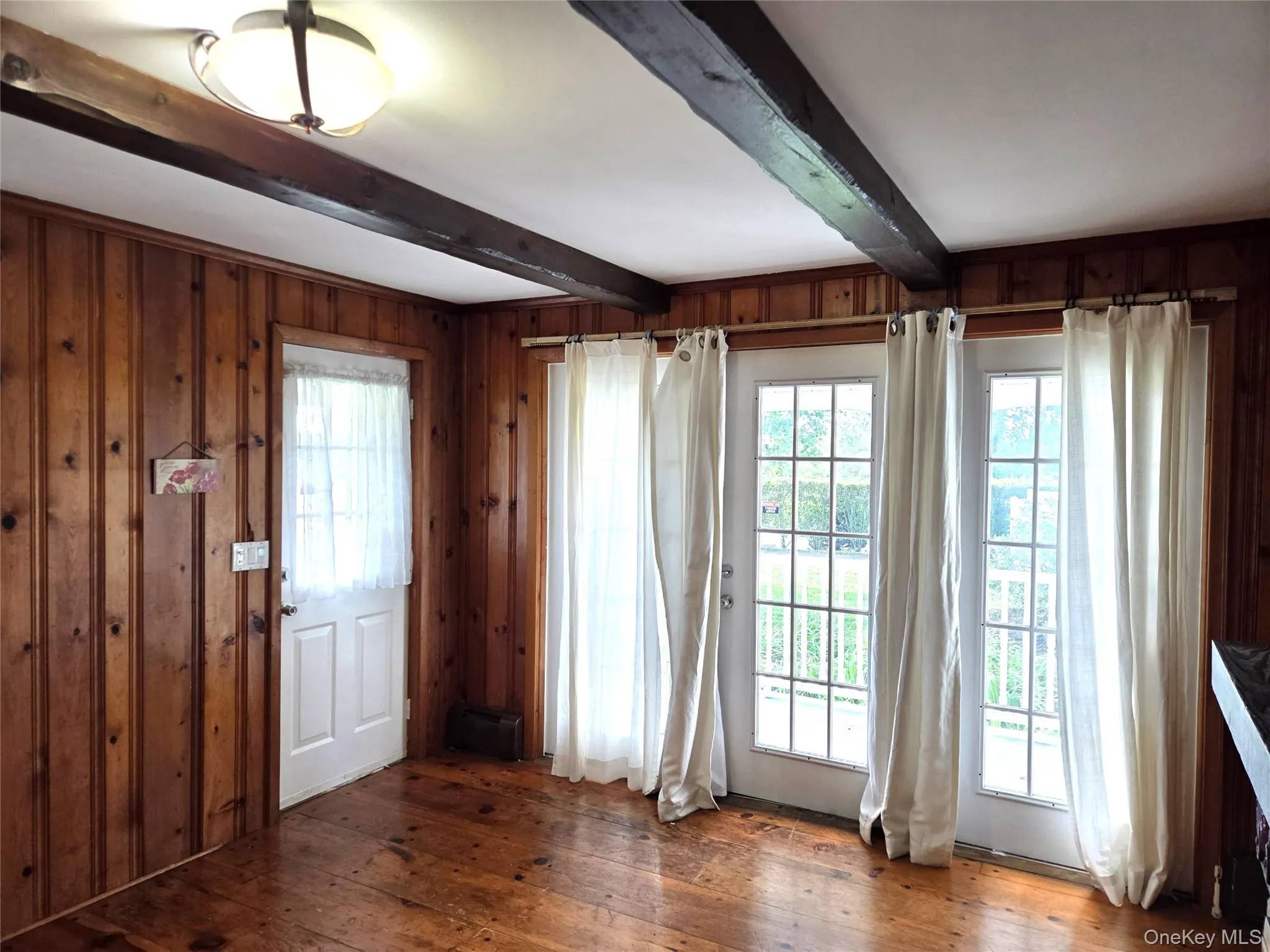 The Home Offers A Front Formal Dining Room Or Den/Sitting Room With Vintage Wide Plank Hardwood Floors, Original Beamed Ceilings, Tongue & Groove Pine Walls & So Much Character & Charm. The Home Offers A Front Formal Dining Room Or Den/Sitting Room With Vintage Wide Plank Hardwood Floors, Original Beamed Ceilings, Tongue & Groove Pine Walls & So Much Character & Charm.