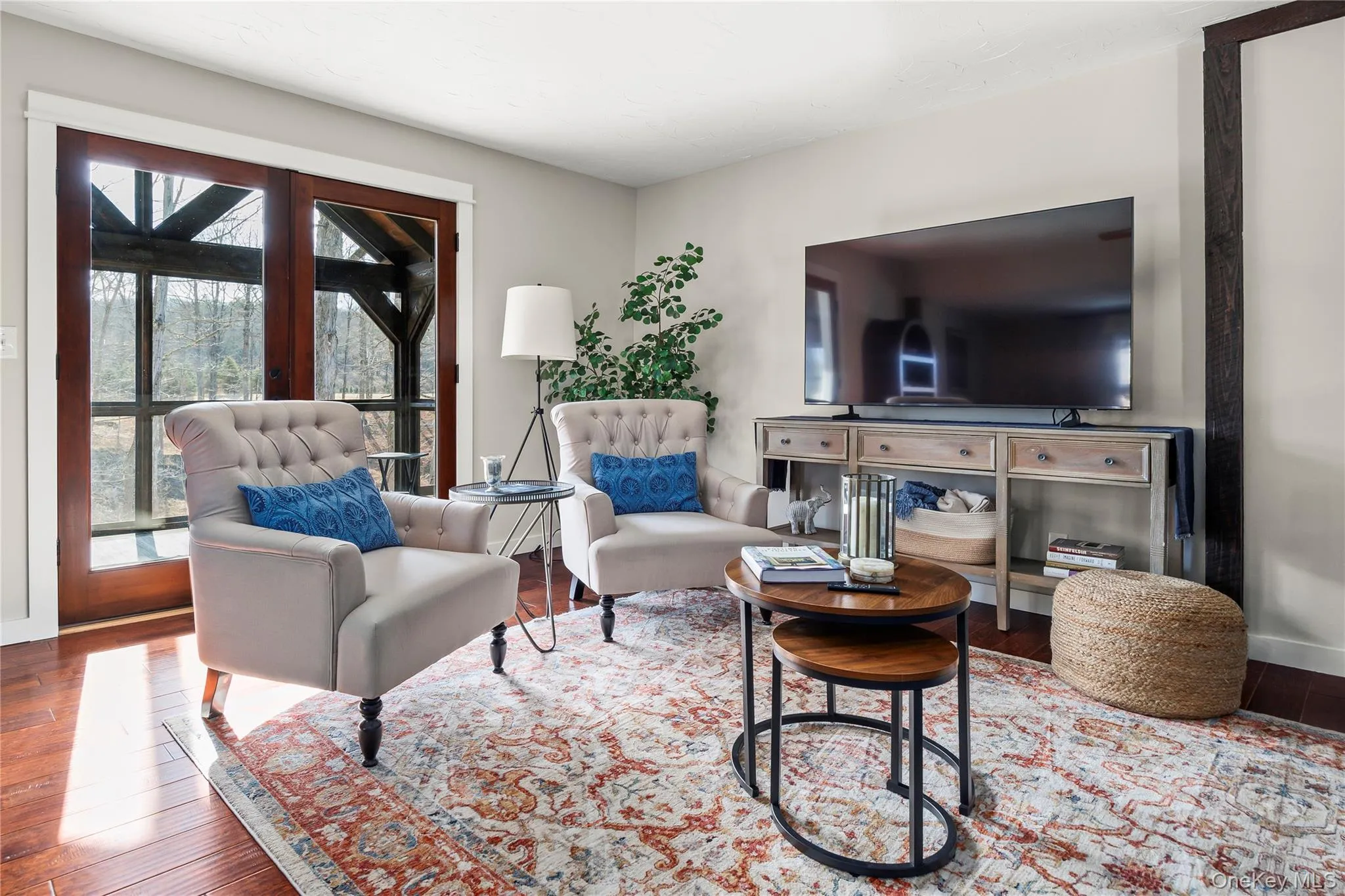 Living Room with screened-in porch beyond Living Room with screened-in porch beyond
