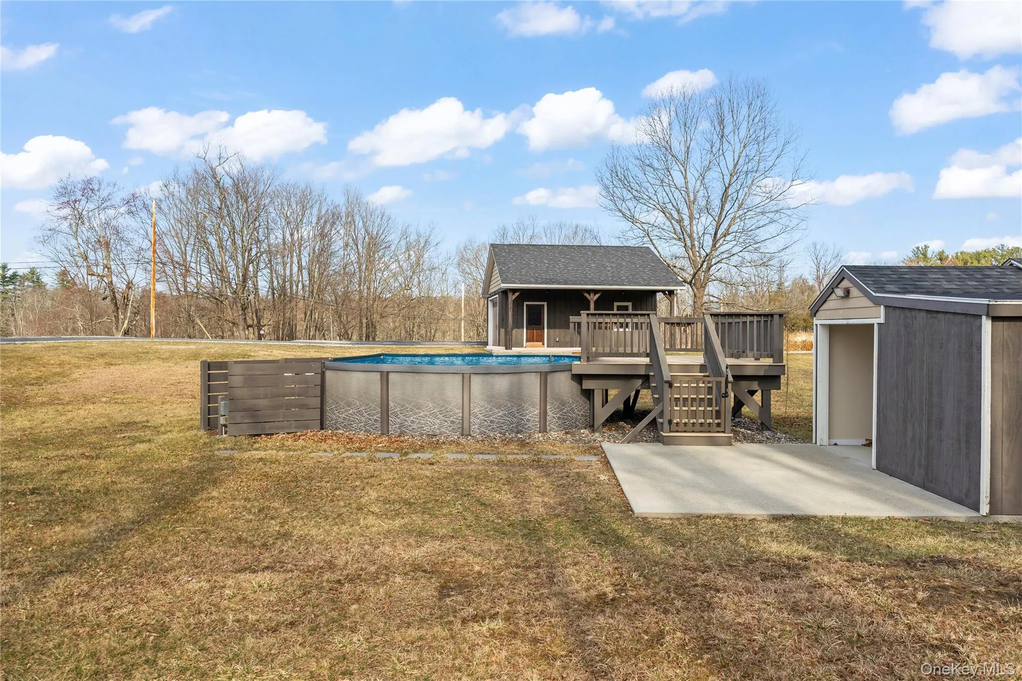 Pool with cabana/storage shed Pool with cabana/storage shed