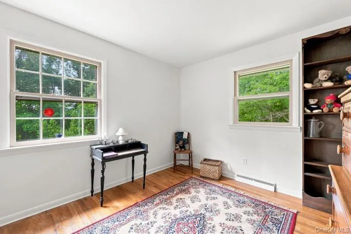 bedroom With large windows overlooking yard bedroom With large windows overlooking yard