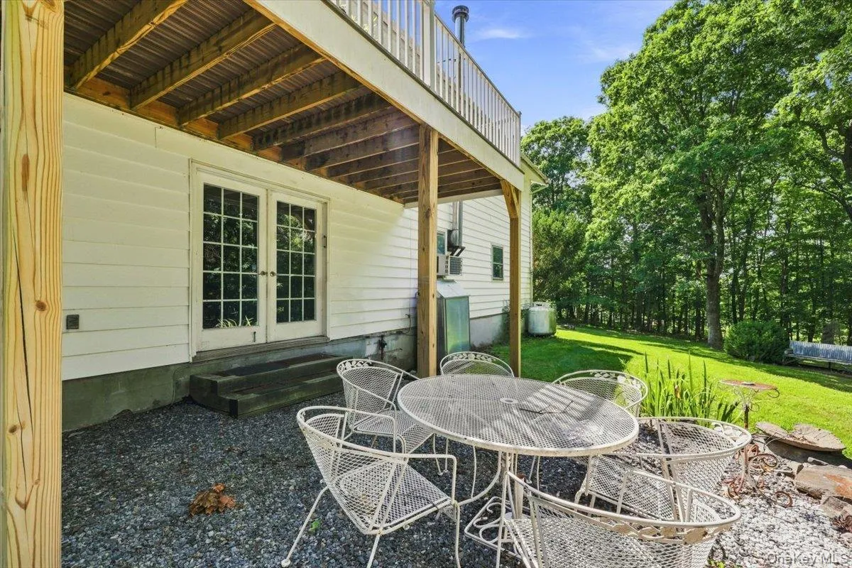 Deck above and patio below overlooking your beautiful back yard. Deck above and patio below overlooking your beautiful back yard.