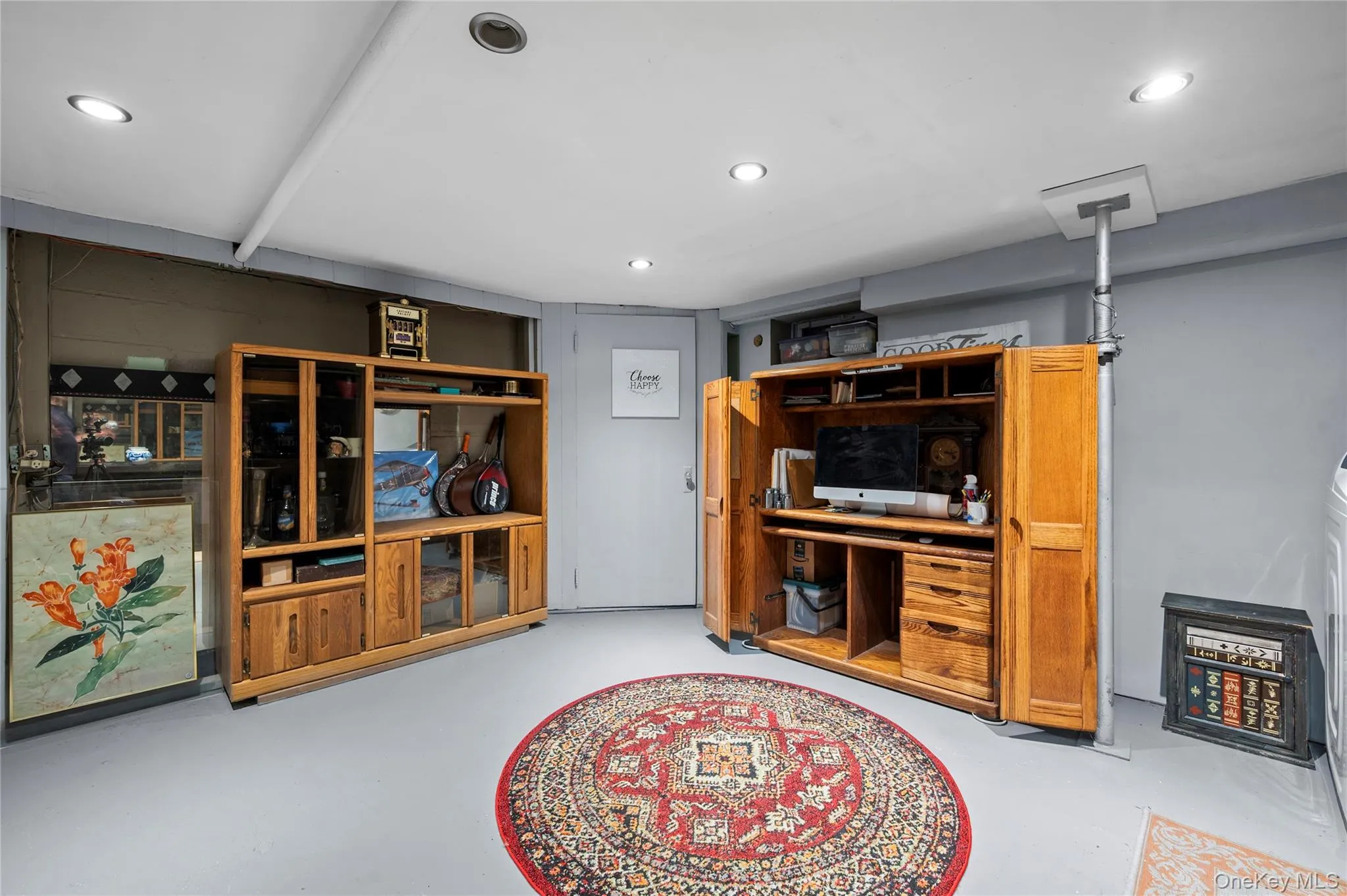 Lower level with access to the garage and laundry area Lower level with access to the garage and laundry area