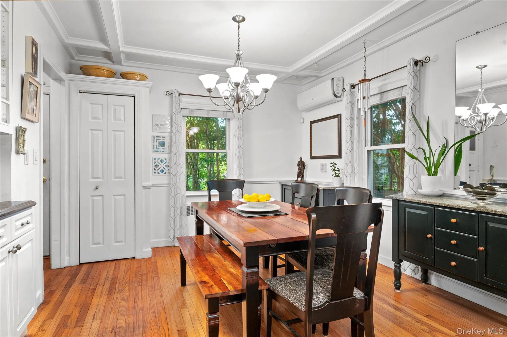 Two windows fill the dining room with abundant natural light Two windows fill the dining room with abundant natural light