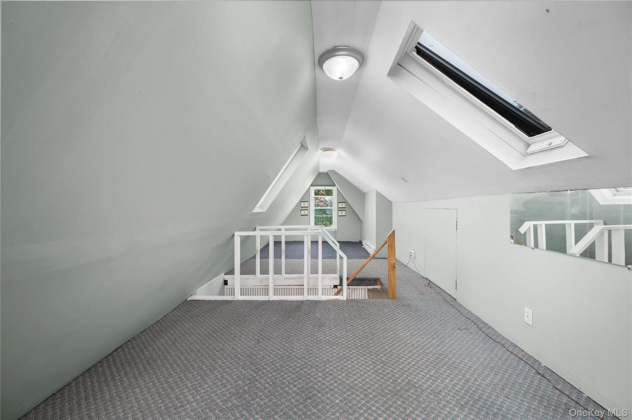 There is a skylight in the attic for more natural light There is a skylight in the attic for more natural light