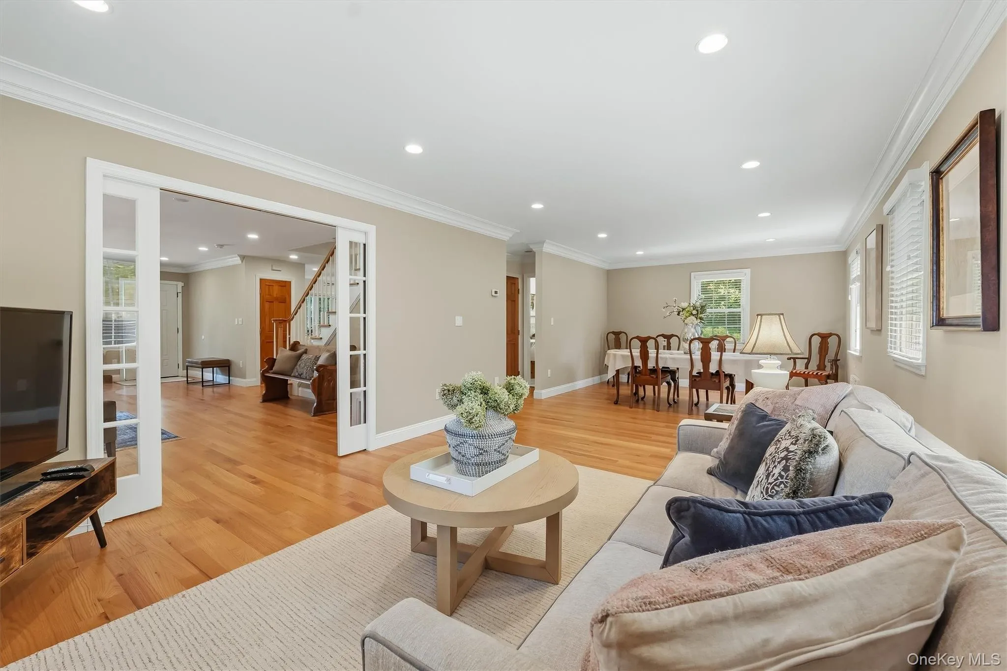An intimate sitting area with an effortless connection to the dining room. An intimate sitting area with an effortless connection to the dining room.
