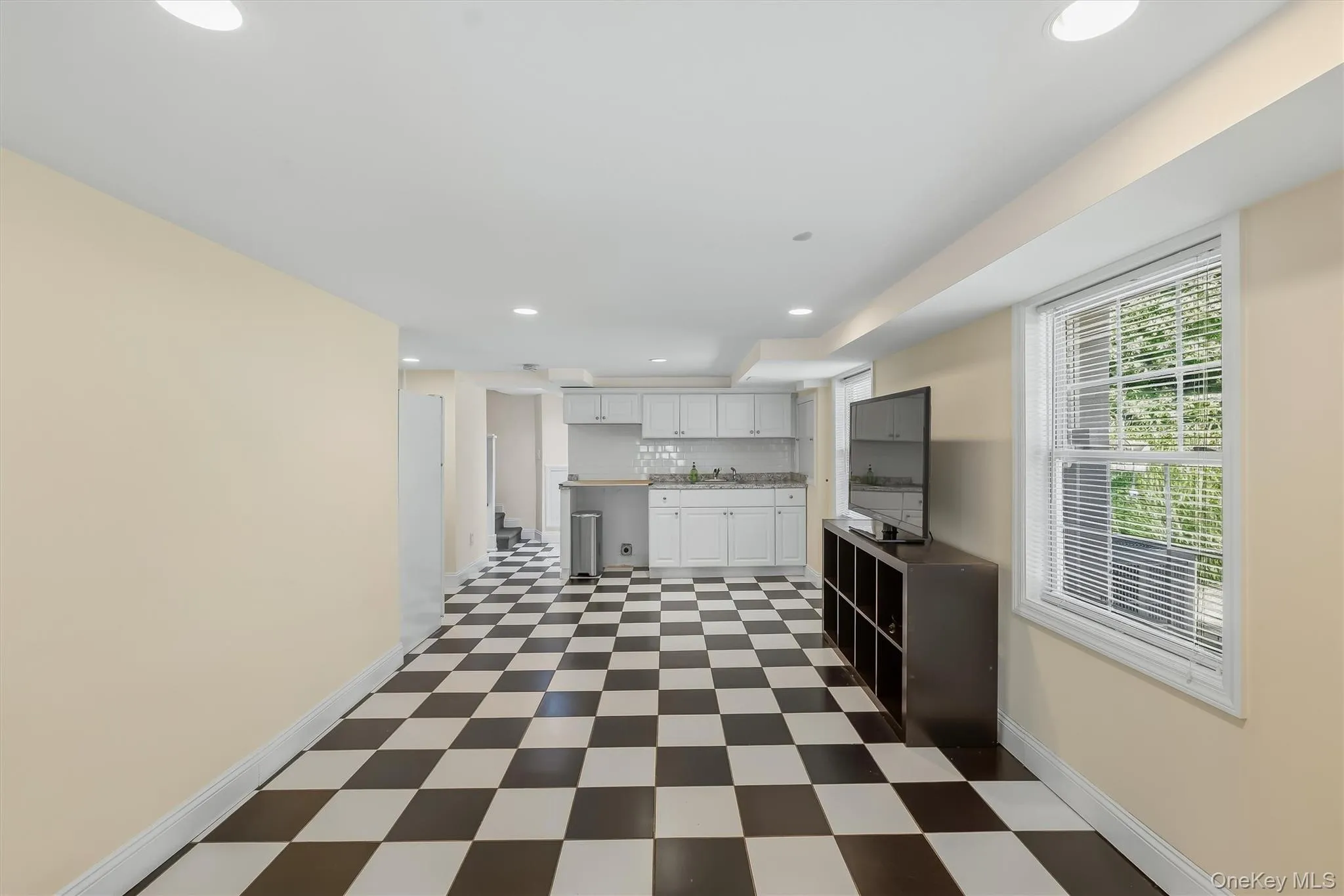 Downstairs, a whole new dimension of living space awaits. Downstairs, a whole new dimension of living space awaits.