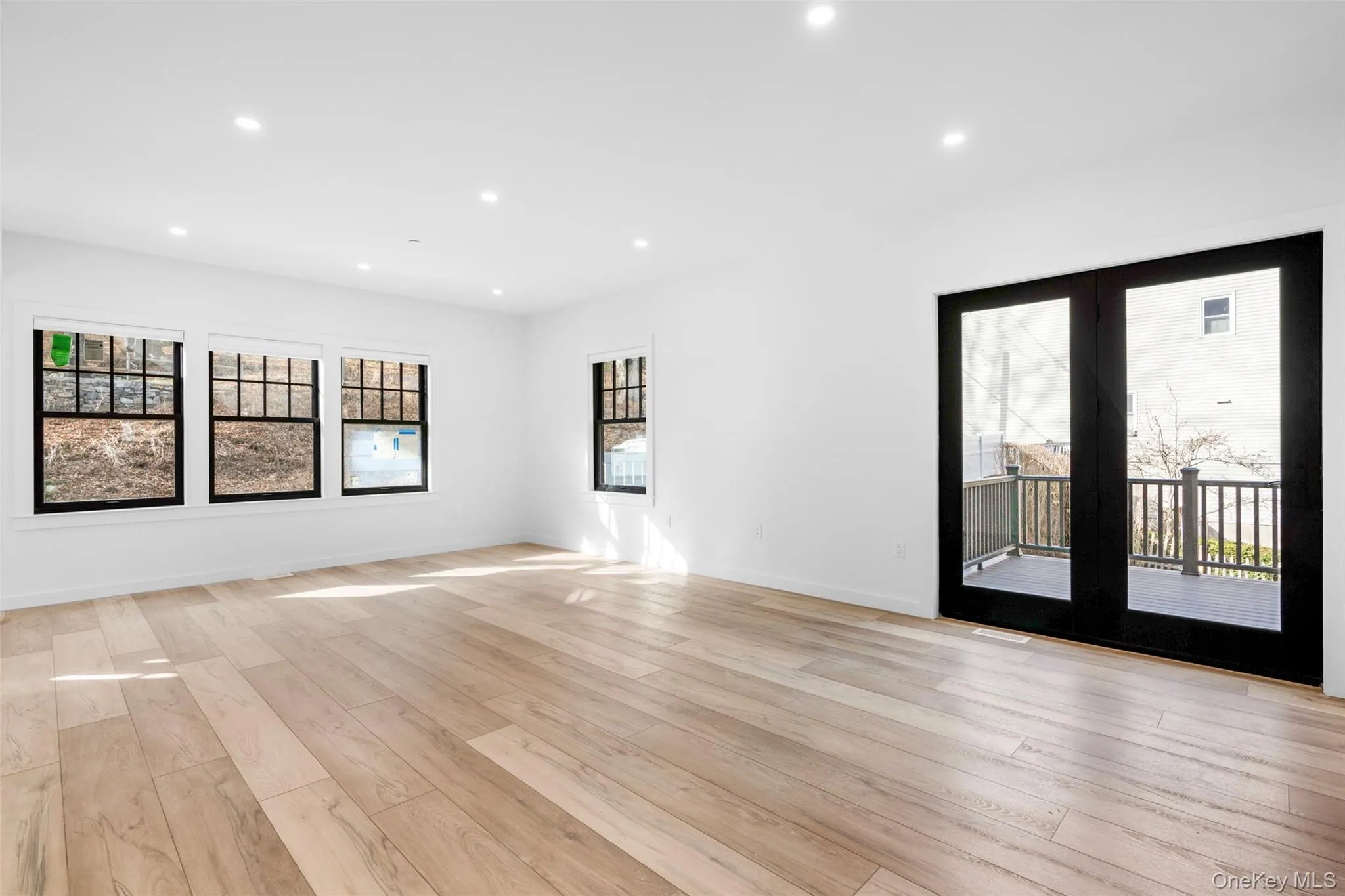 Living /Dining Area Combo with French doors to Deck Living /Dining Area Combo with French doors to Deck
