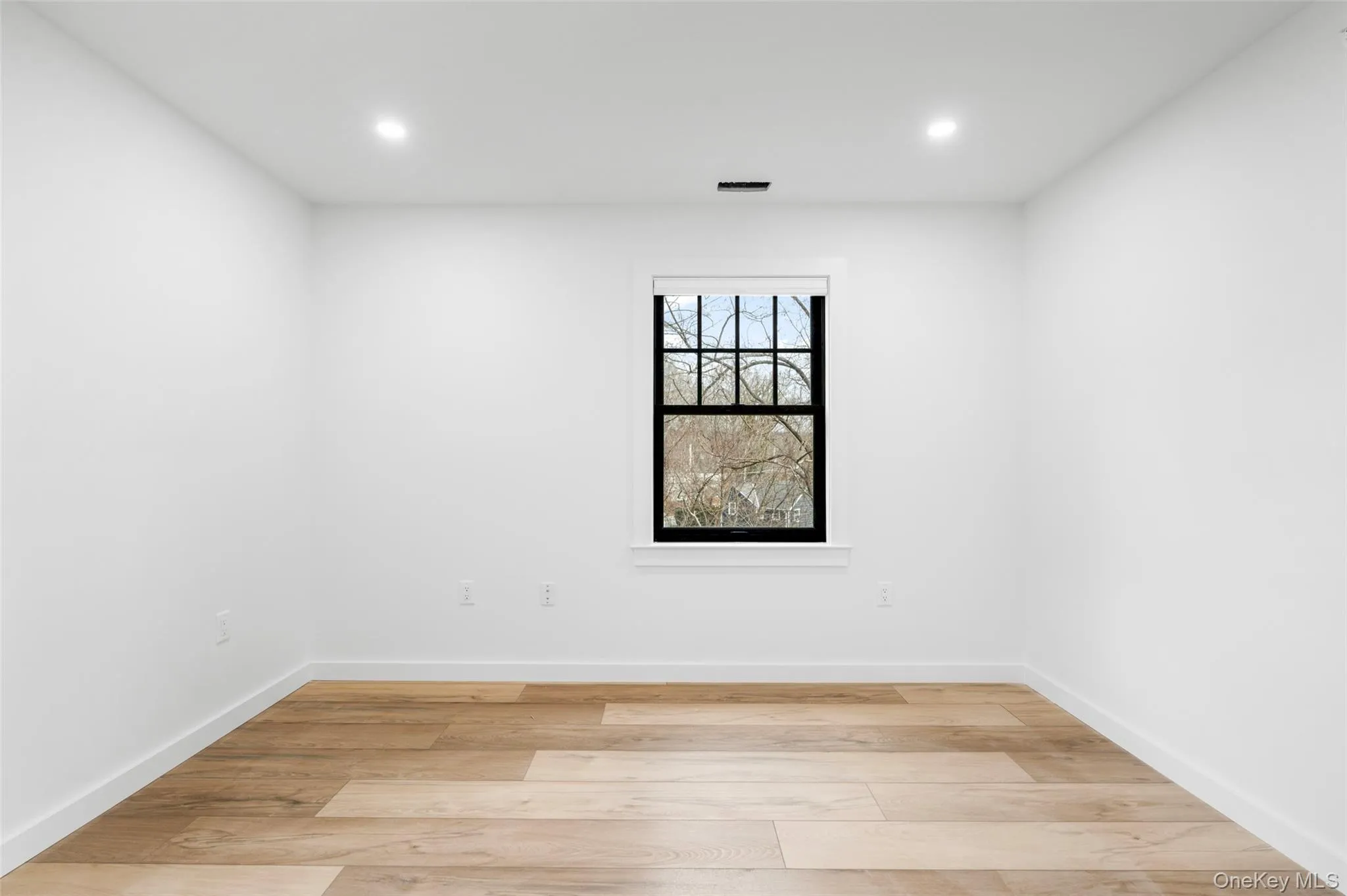 Spare room with light wood-type flooring Spare room with light wood-type flooring