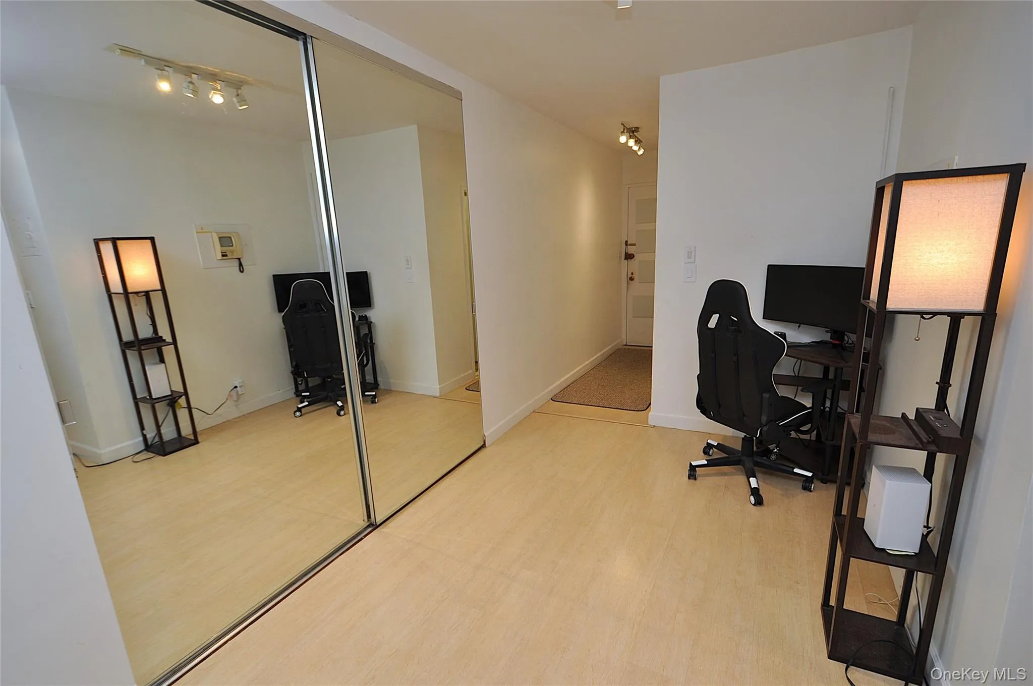 Entry foyer opens to the living room and is a great place for a home office set up. Entry foyer opens to the living room and is a great place for a home office set up.