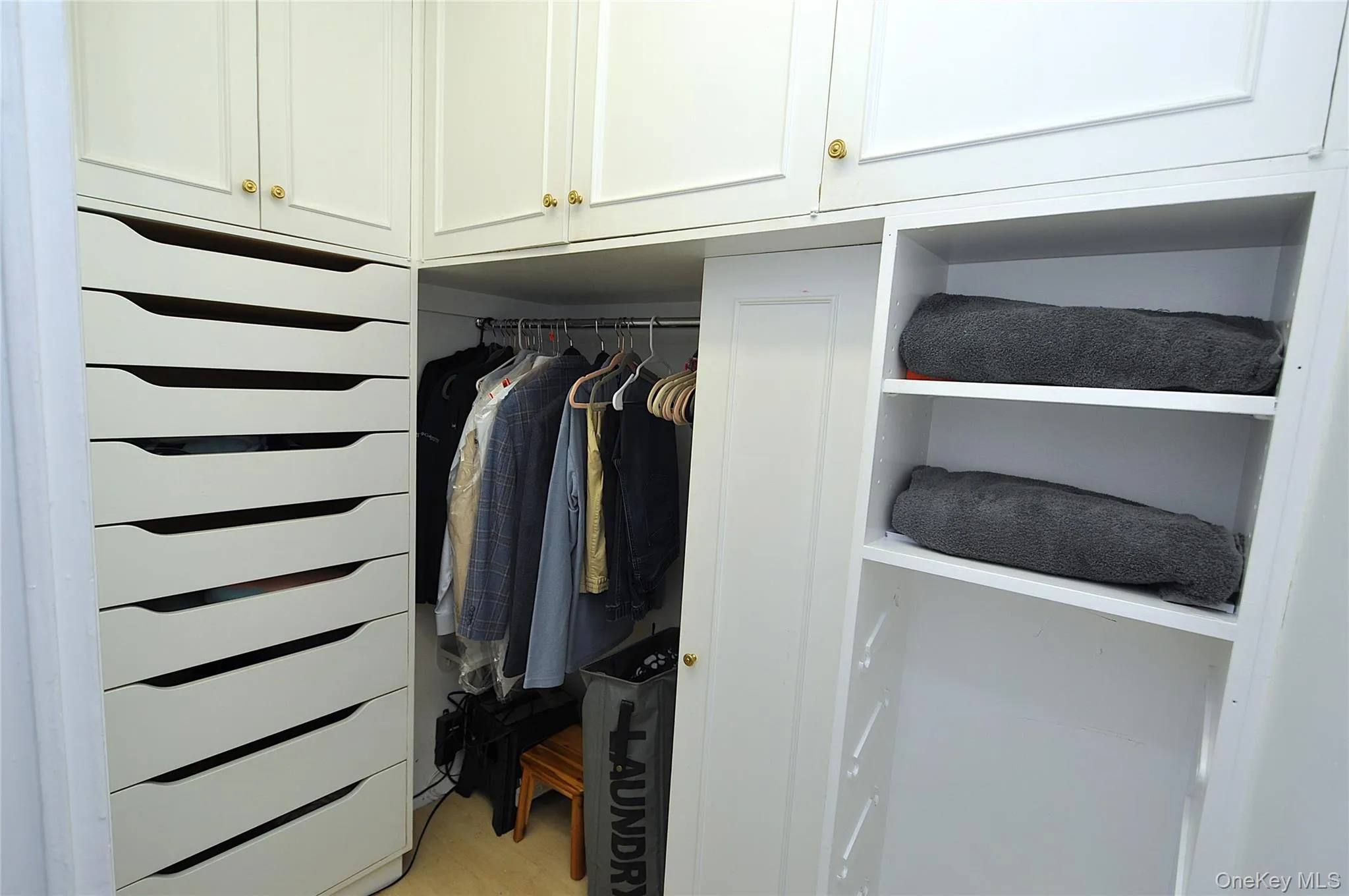 Large bedroom walk-in closet Large bedroom walk-in closet