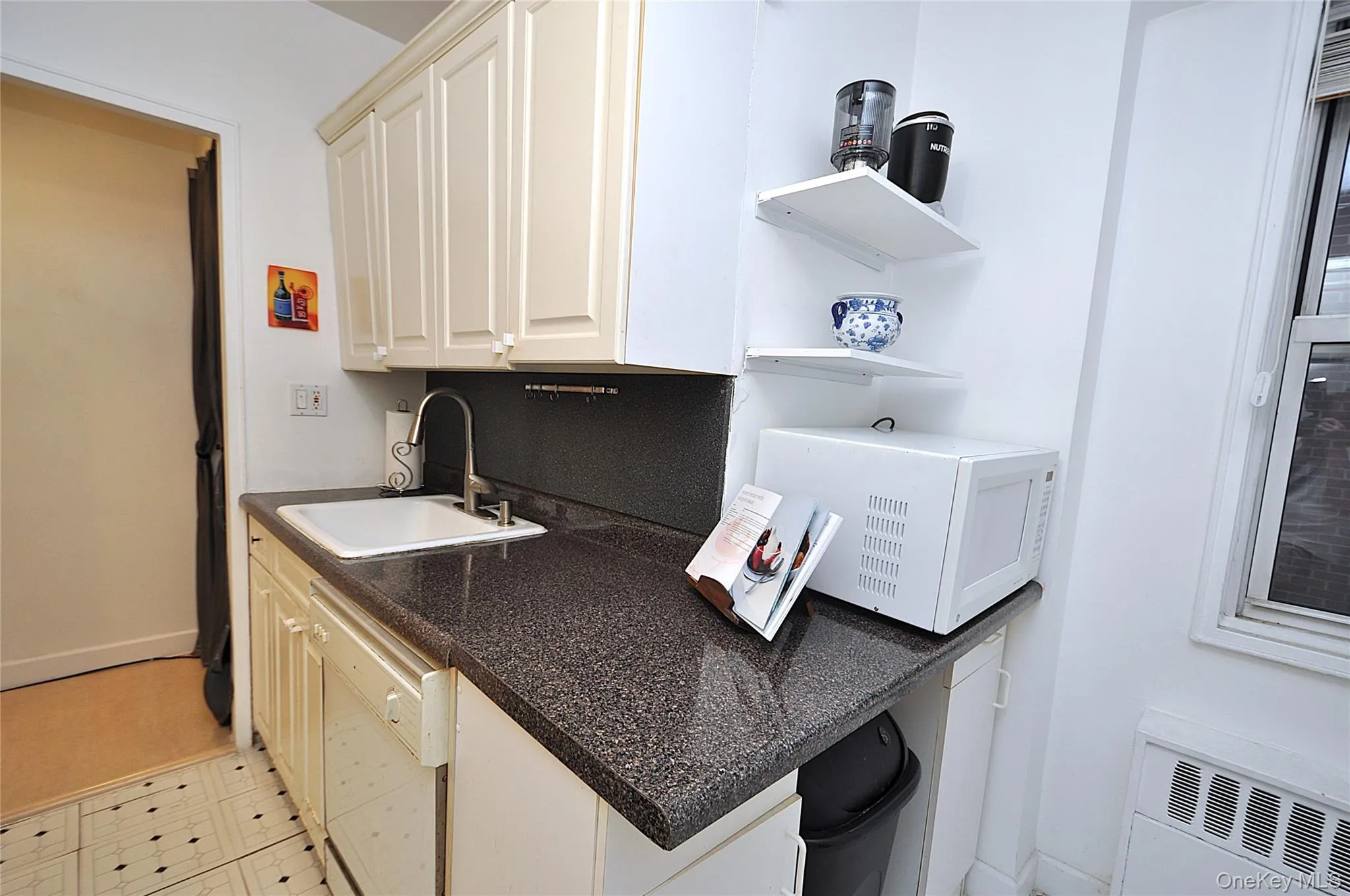 Walk-thru eat-in-kitchen. Walk-thru eat-in-kitchen.