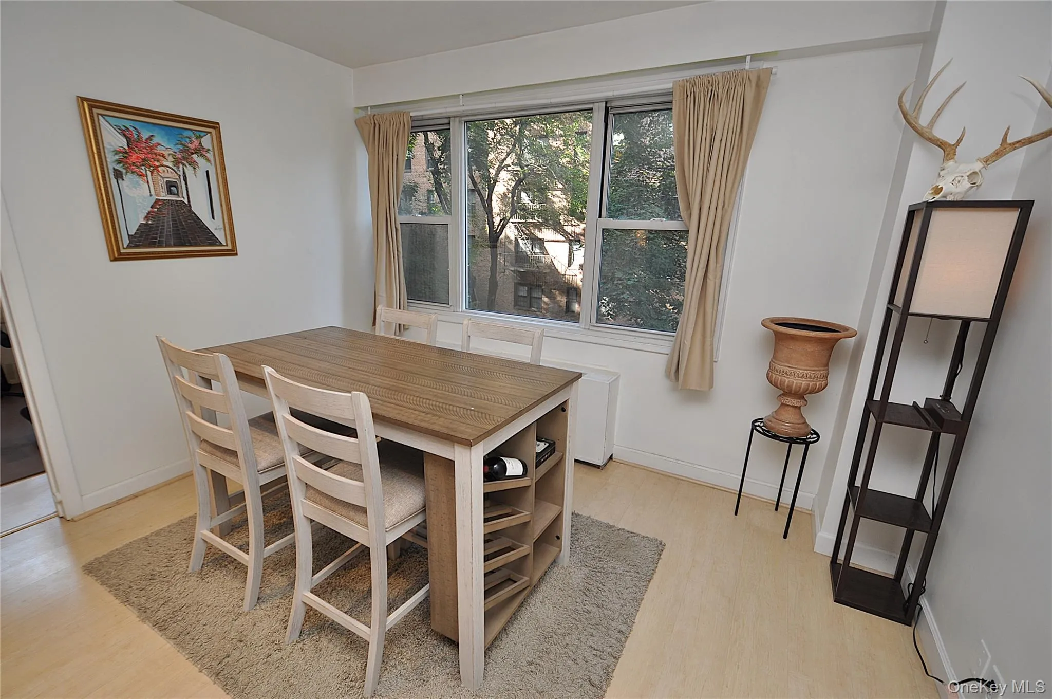 The dining area opens to the living room. The dining area opens to the living room.