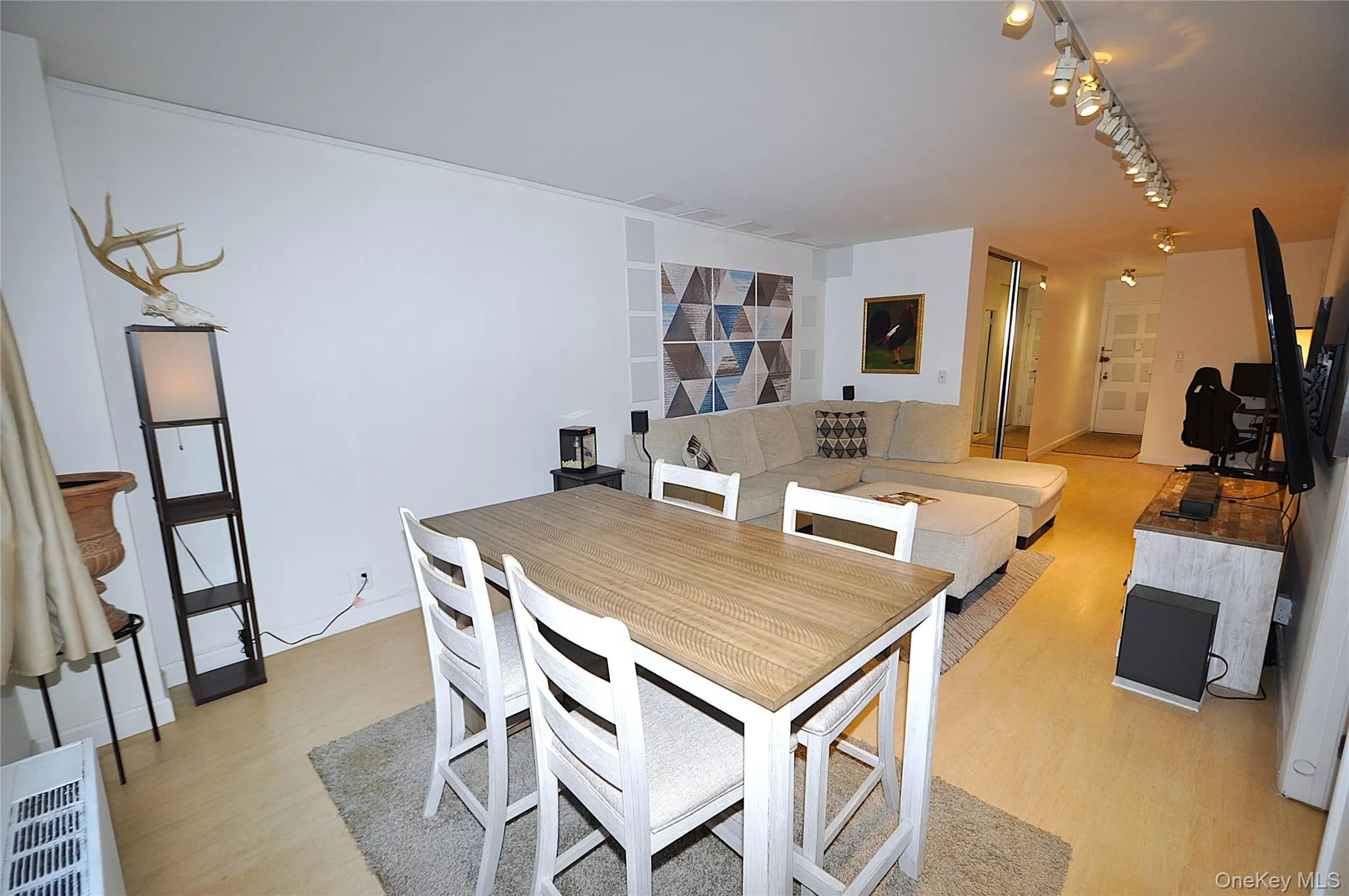 The dining area opens to the living room. The dining area opens to the living room.