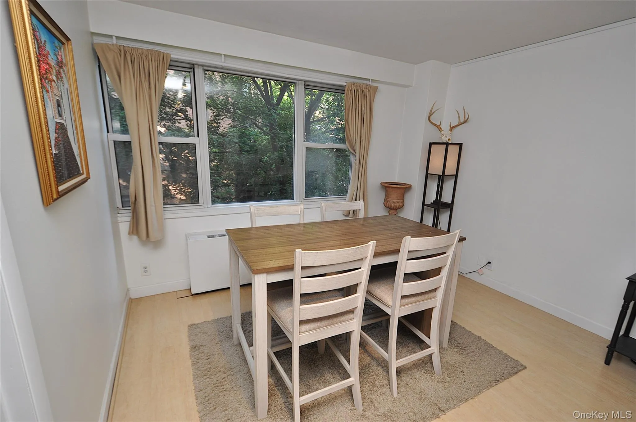The dining area opens to the living room. The dining area opens to the living room.