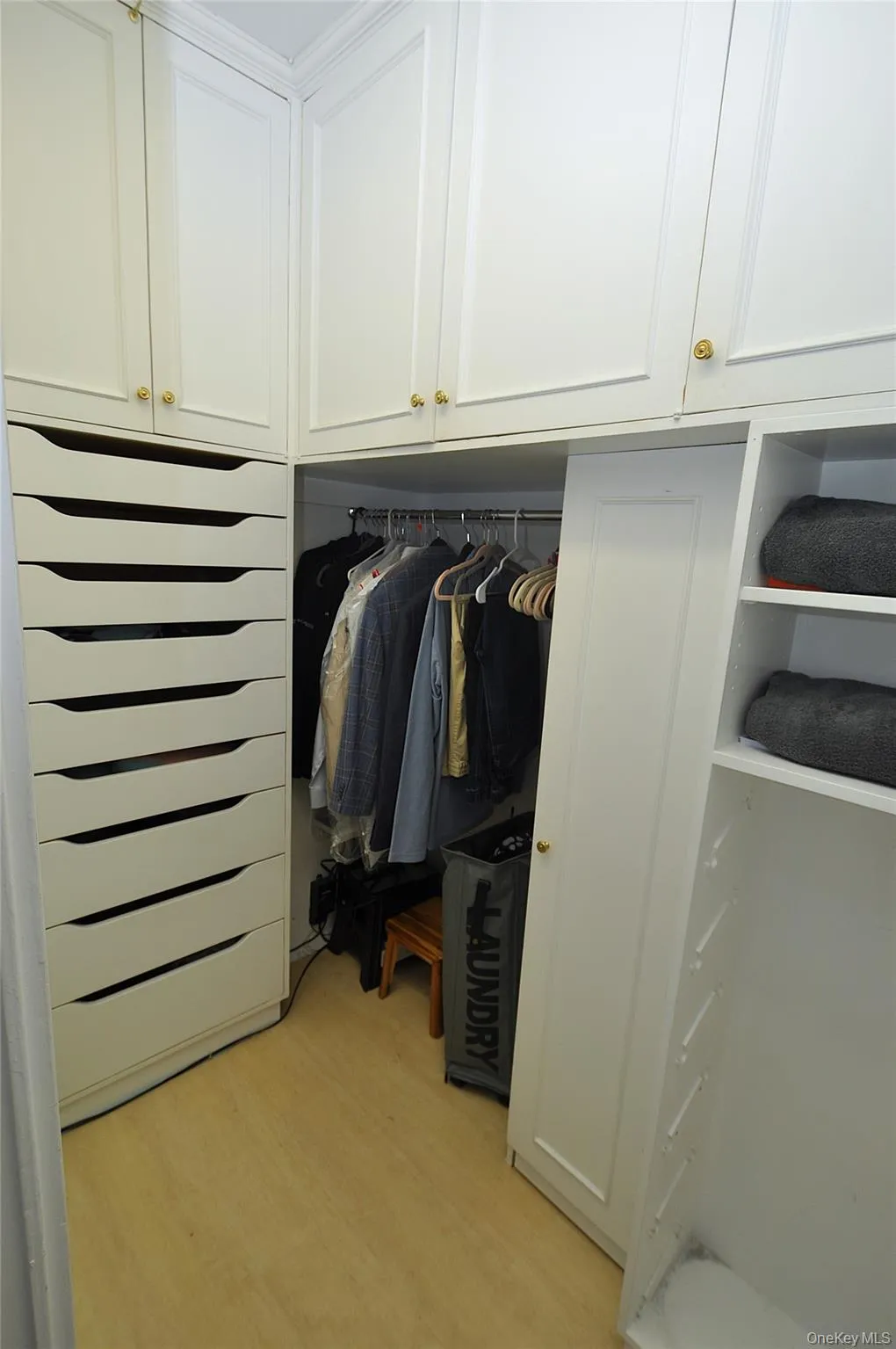 Large bedroom walk-in closet Large bedroom walk-in closet