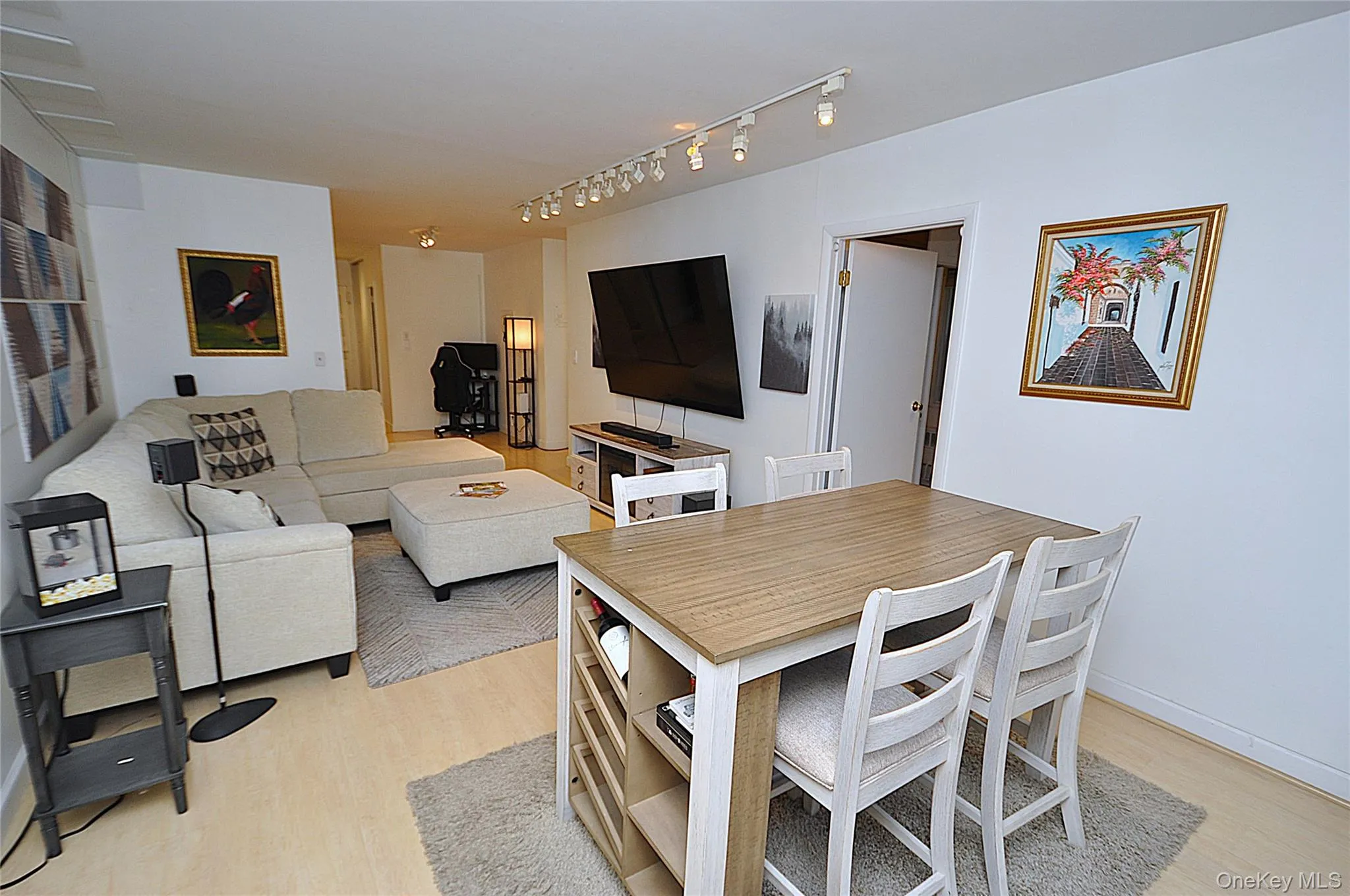 The dining area opens to the living room. The dining area opens to the living room.