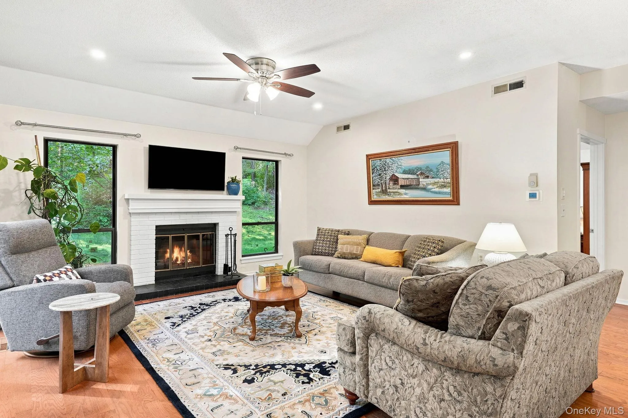 Open ConceptLivingroom w/ Fireplace access to patio Open ConceptLivingroom w/ Fireplace access to patio