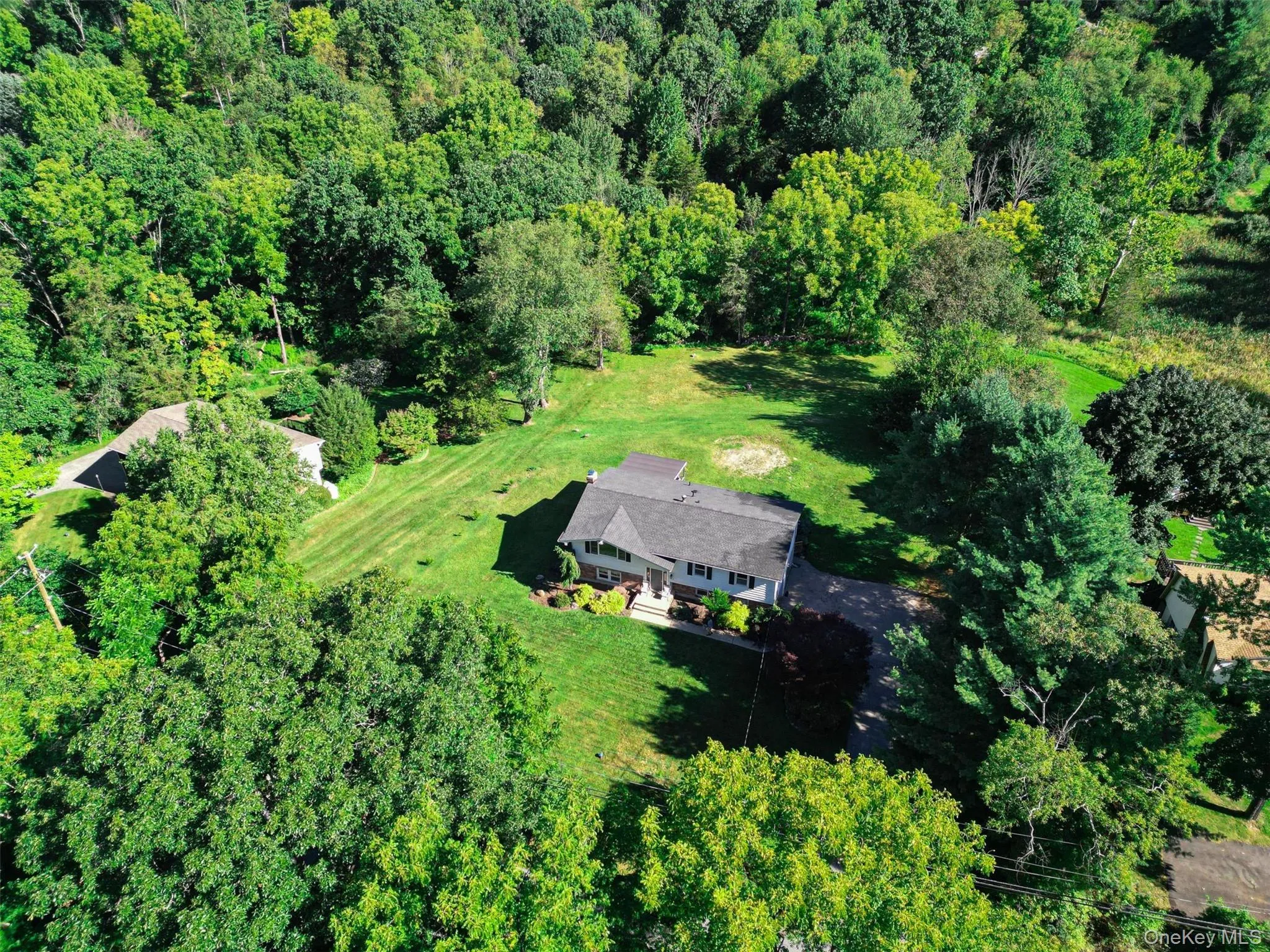 Aerial view show the amazing amount of woodland on and around the property. Aerial view show the amazing amount of woodland on and around the property.