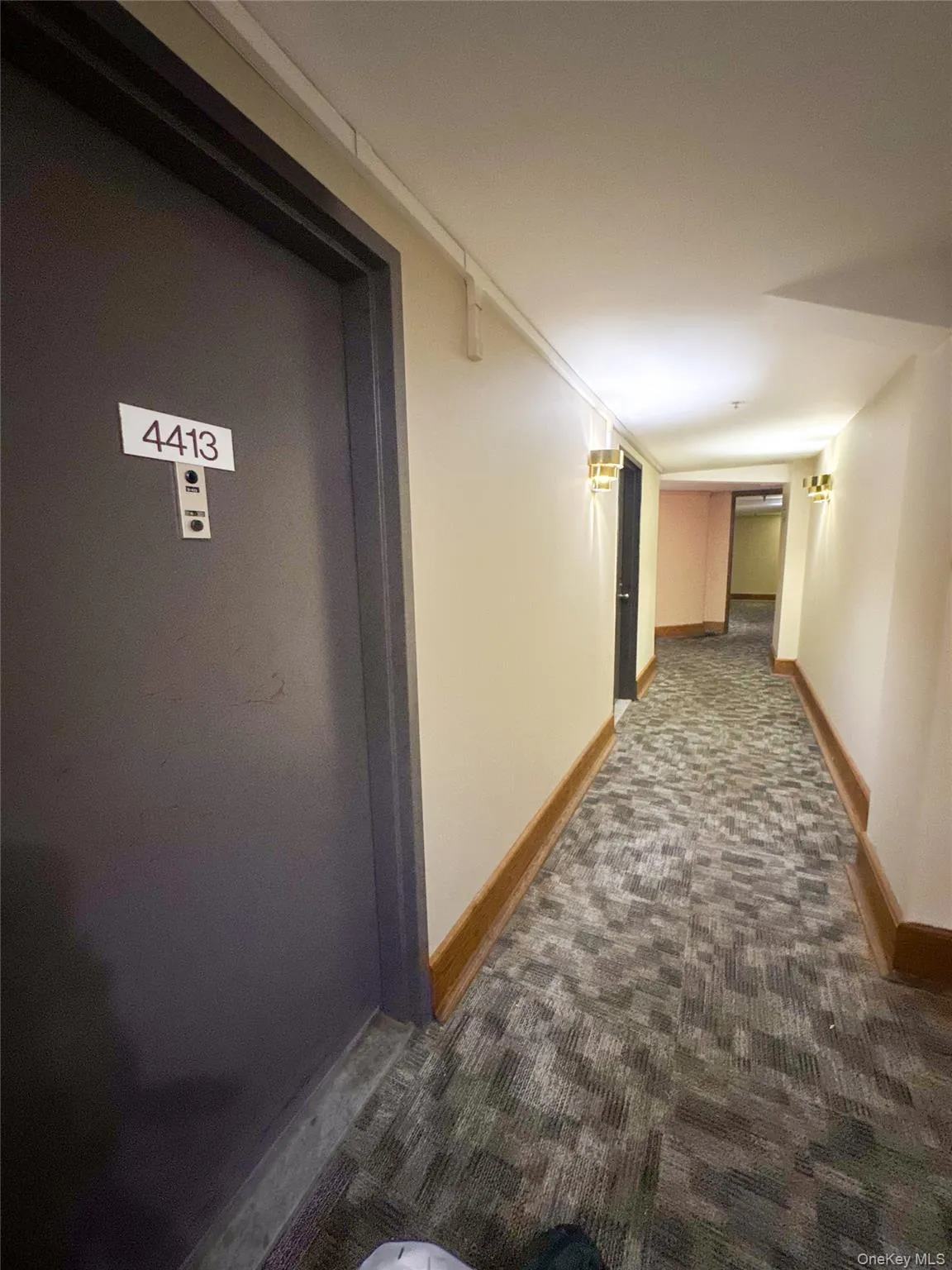 Private residence entrance located along the building’s interior hallway. Private residence entrance located along the building’s interior hallway.