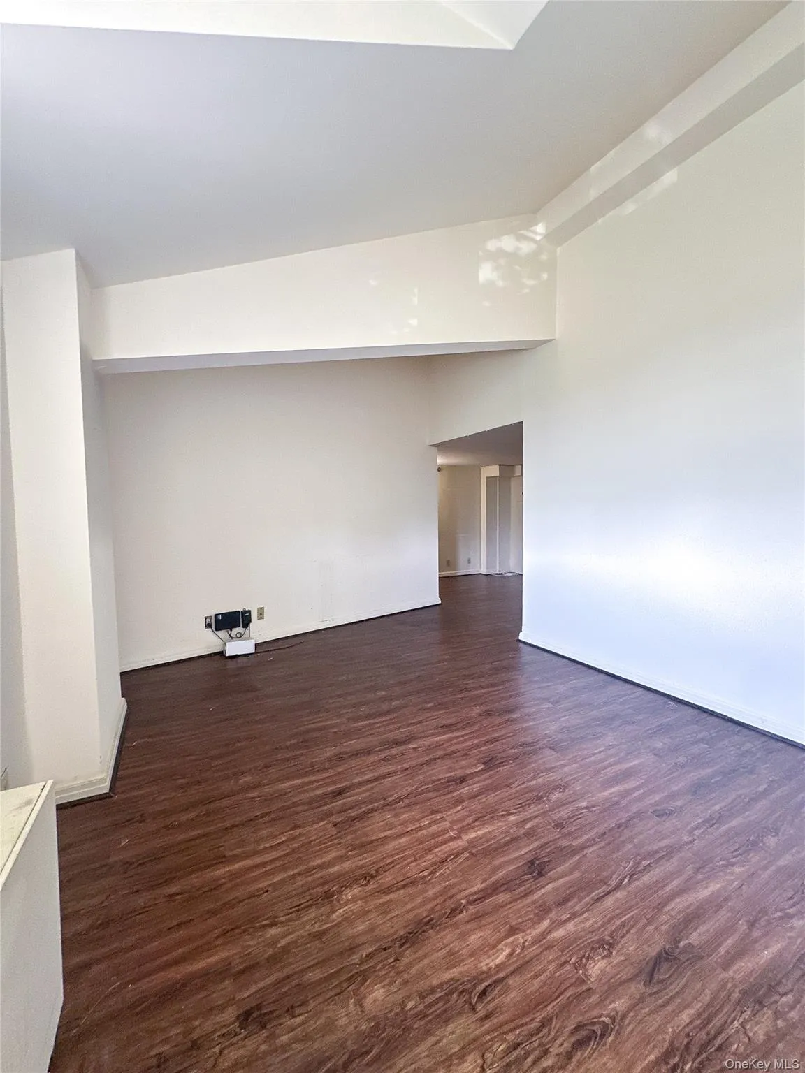Inviting living room with generous natural light and soaring ceilings that enhance the open, spacious feel. Inviting living room with generous natural light and soaring ceilings that enhance the open, spacious feel.