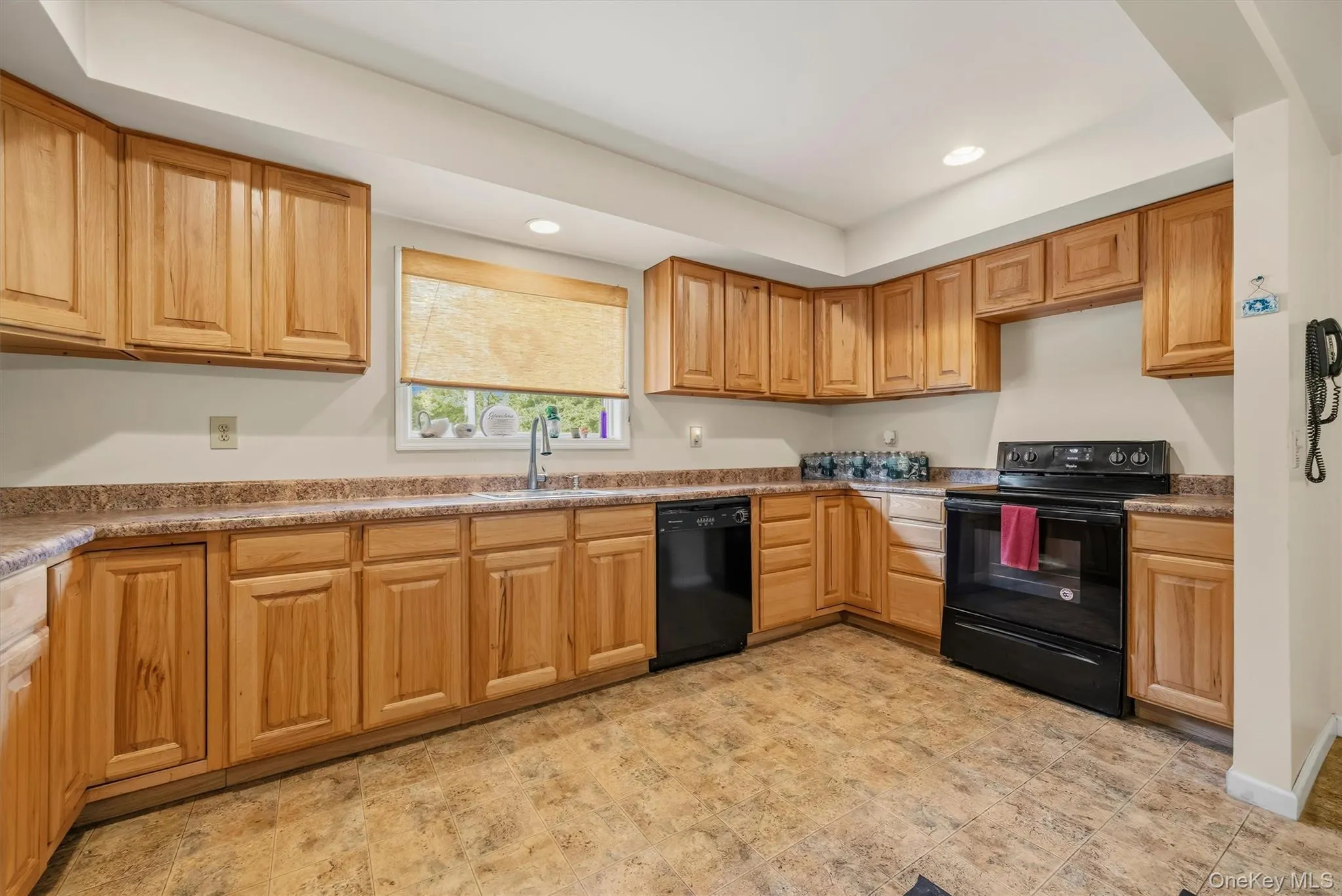 The kitchen offers plenty of countertop space and cabinetry. The kitchen offers plenty of countertop space and cabinetry.