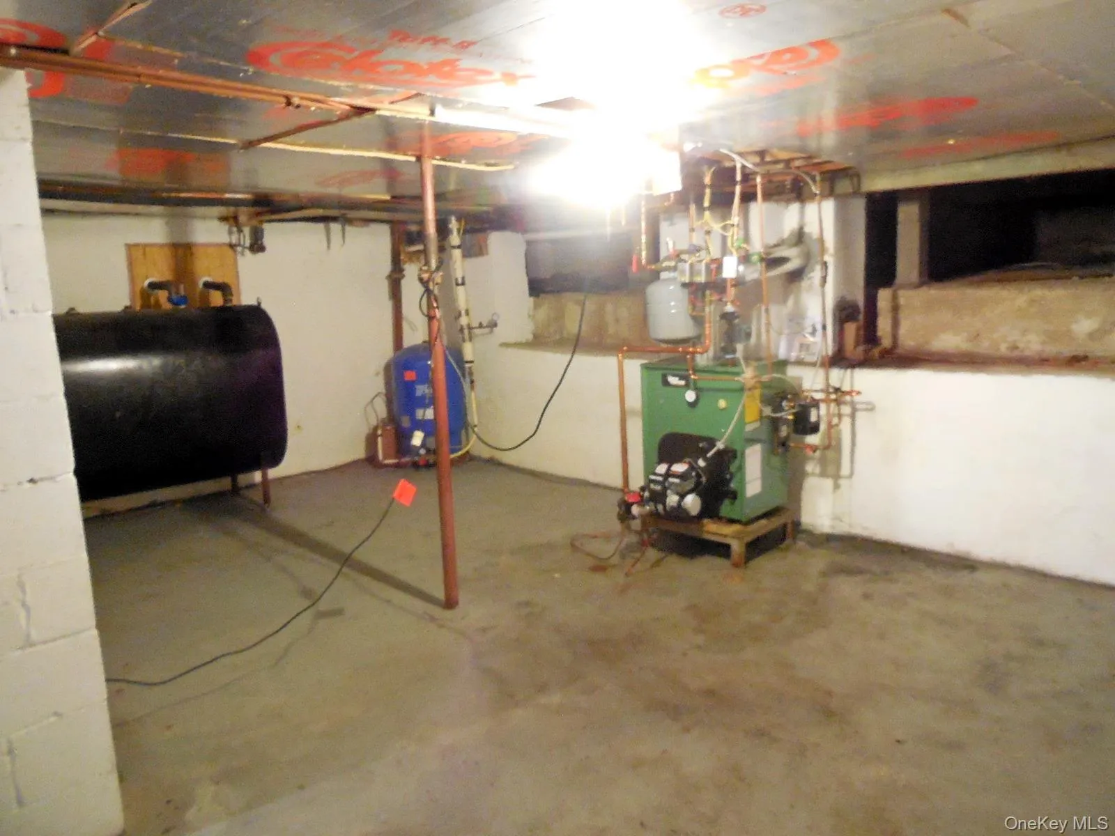 Basement with access to crawl space. Basement with access to crawl space.